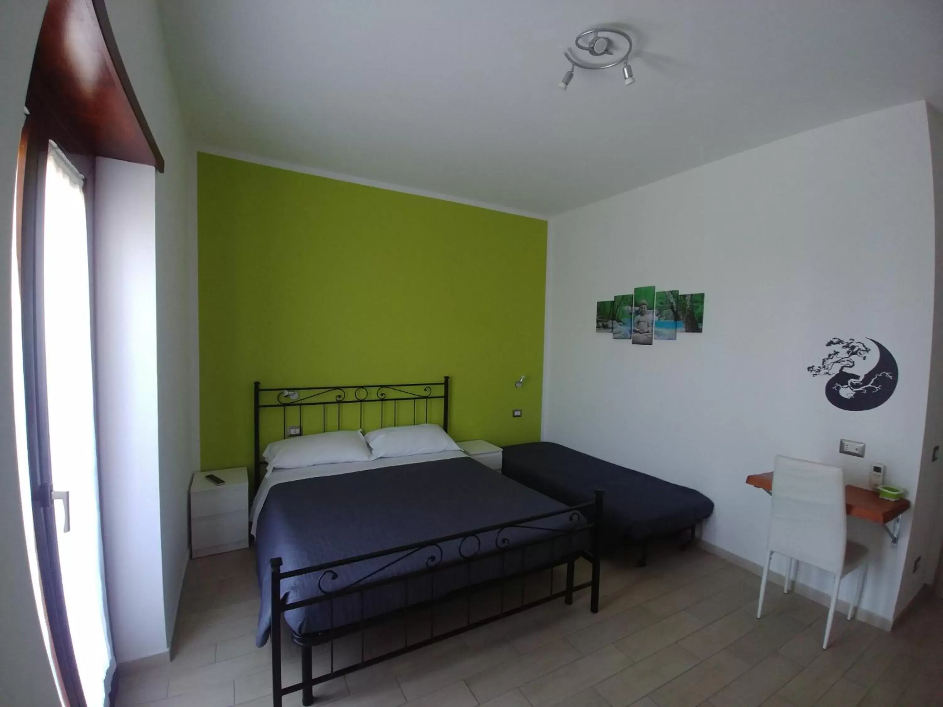 Triple Room with Balcony in Bonsai Bed & Breakfast Triple Room with Balcony in Bonsai Bed & Breakfast