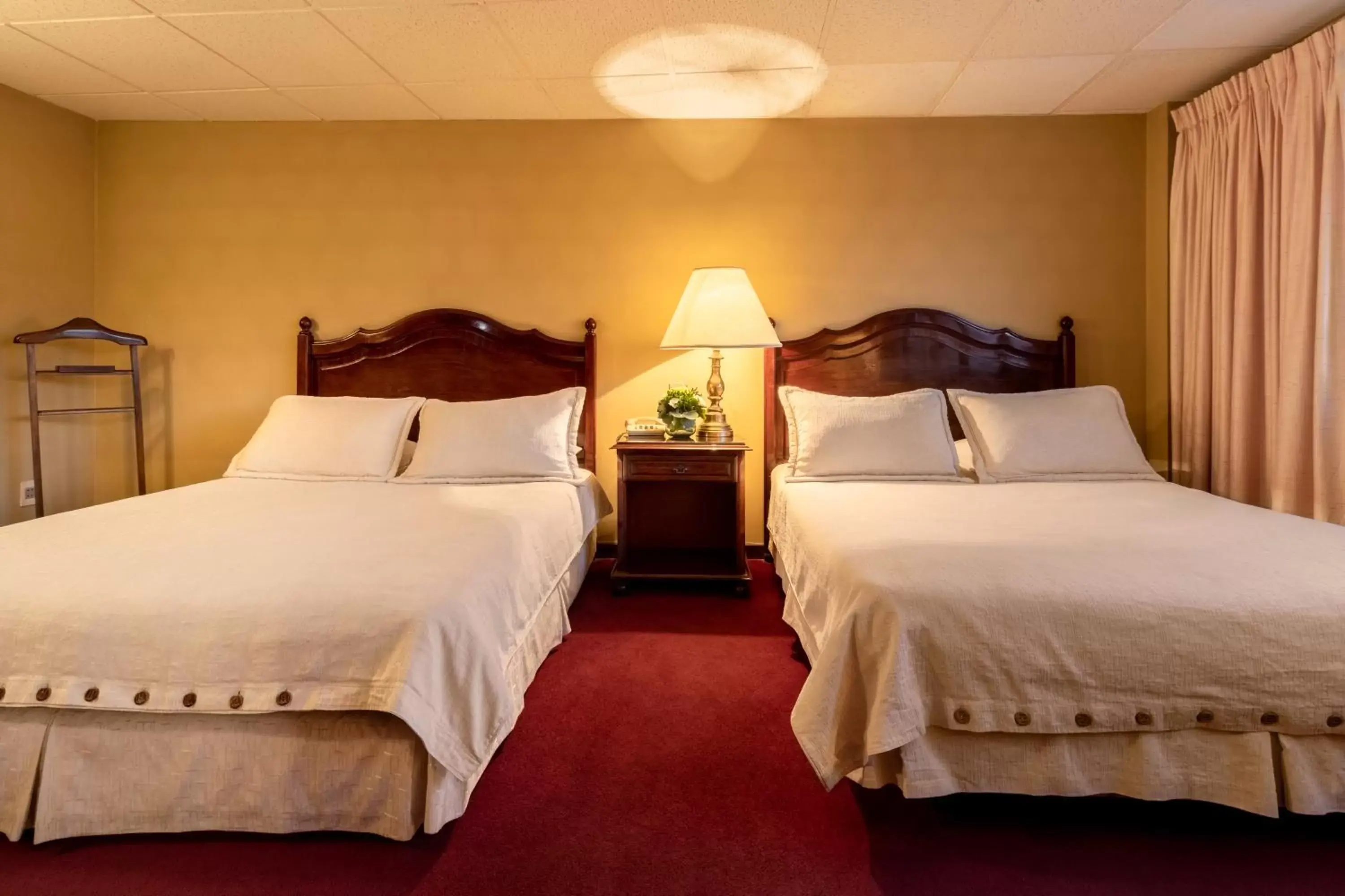 Bed in El Rey Palace Hotel