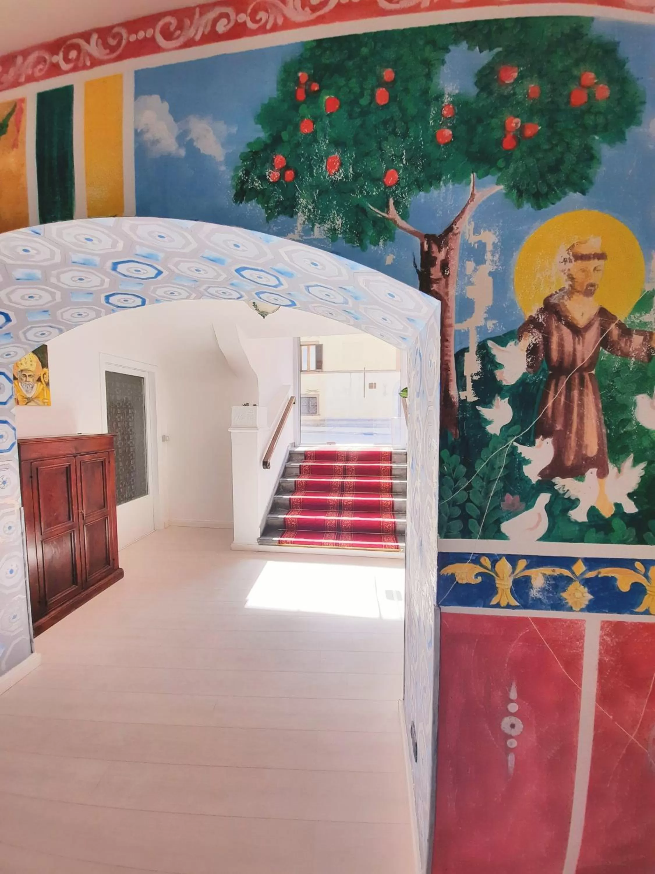 Communal lounge/ TV room in Hotel San Francesco e il lupo