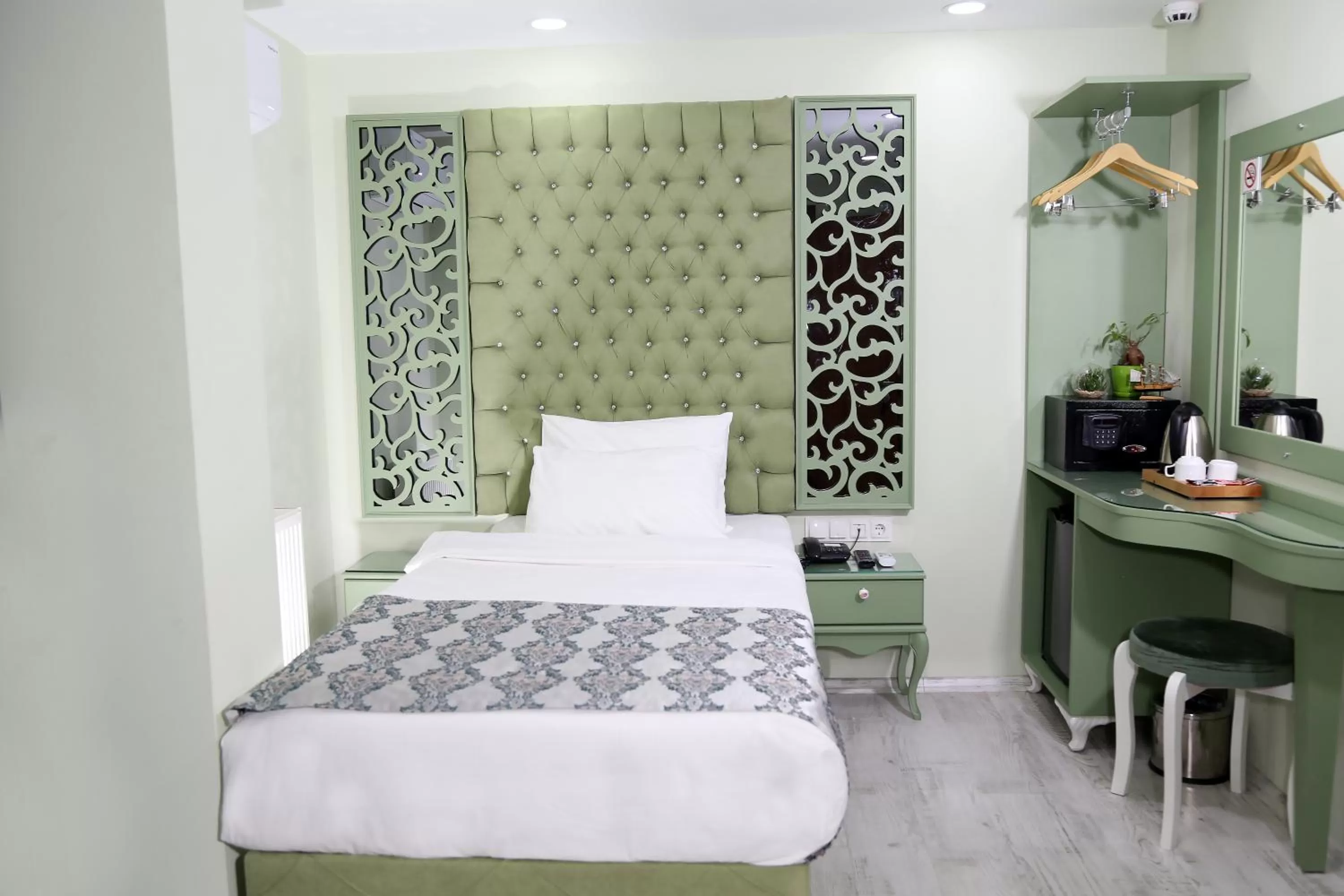 Bed in Green Garden Hotel