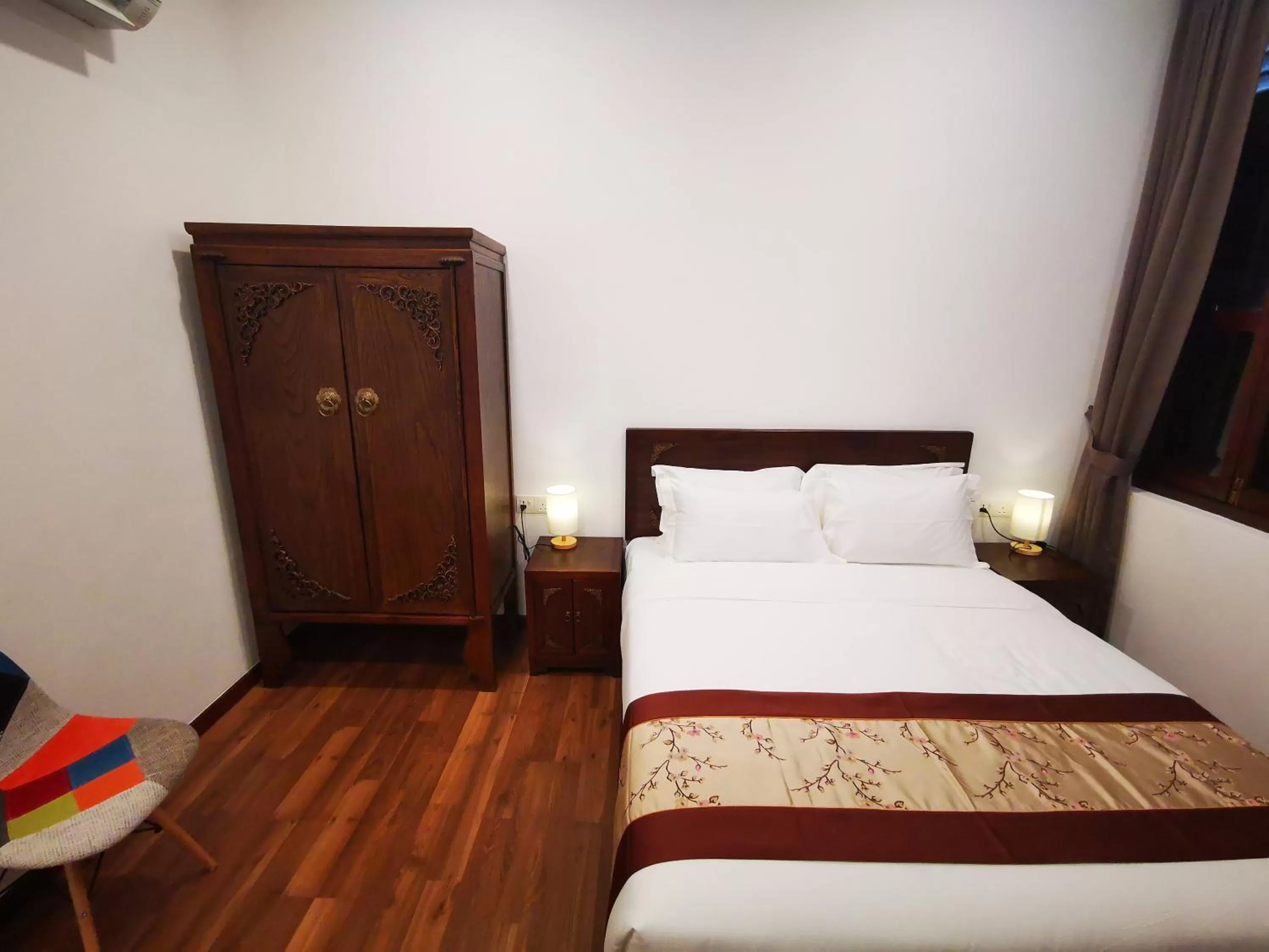 Bed in Mclane Boutique Hotel