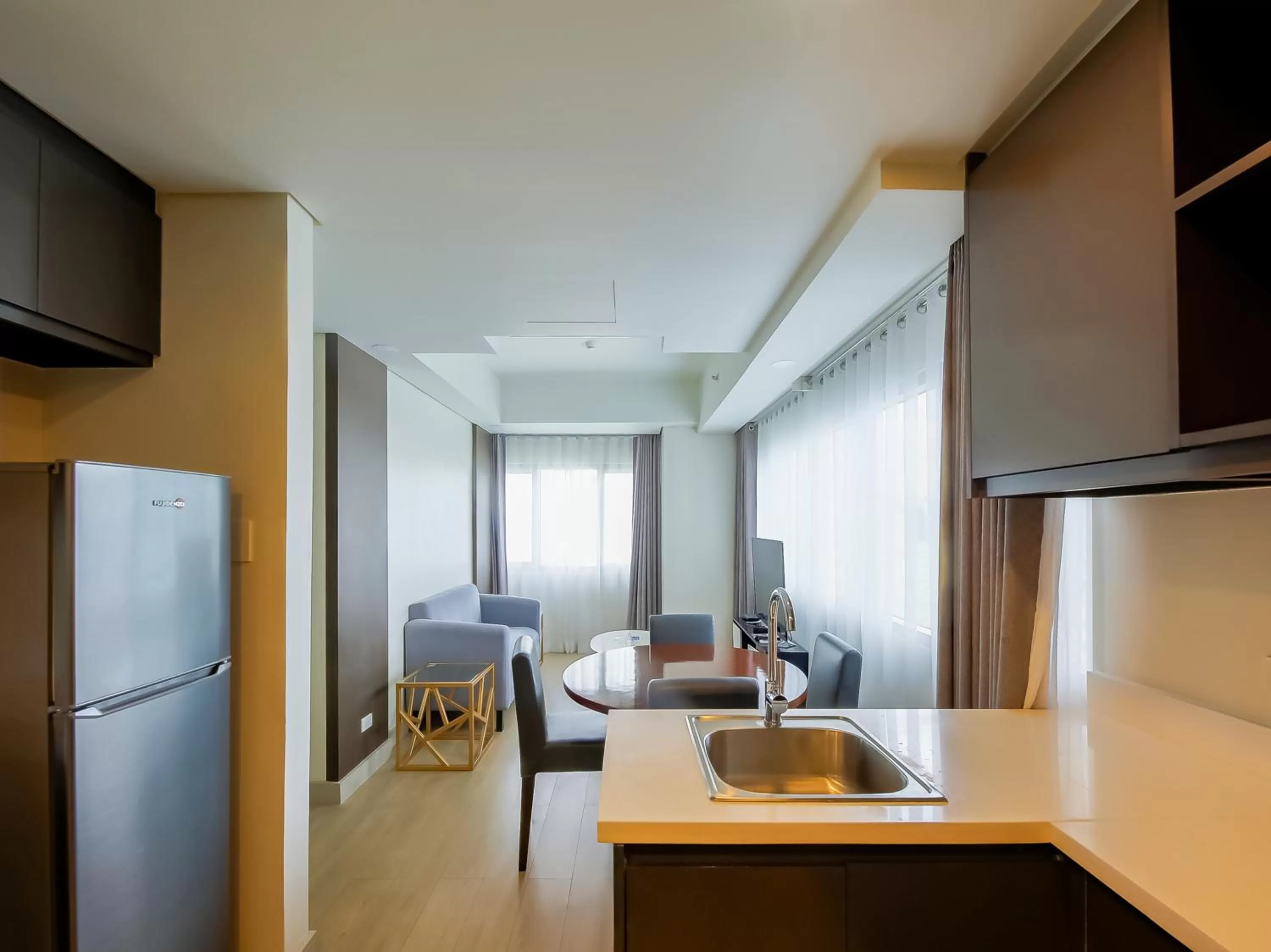 Kitchen or kitchenette, Kitchen/Kitchenette in Capital O 804 The Residences at Bonifacio Civic Center