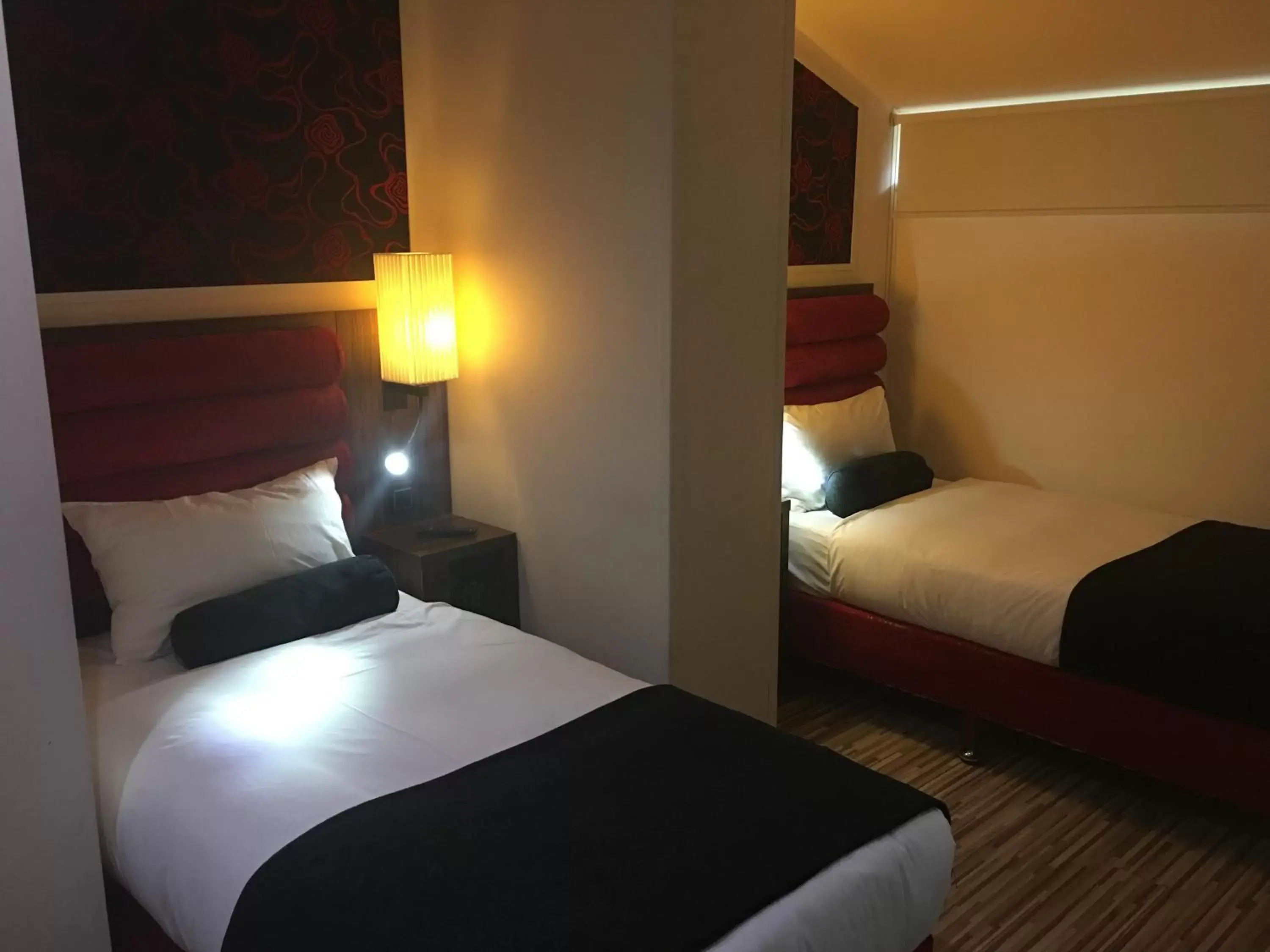 Bed in Simply Rooms & Suites