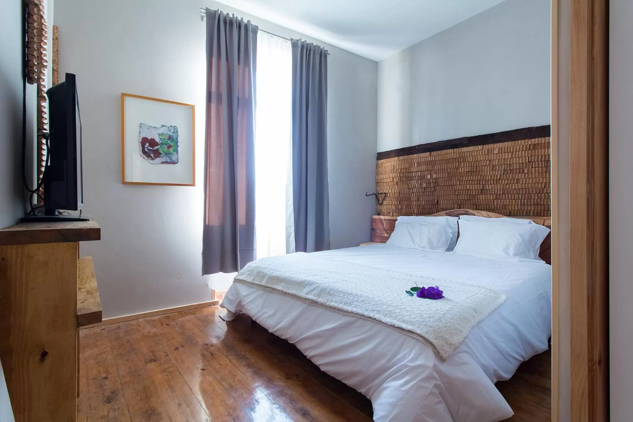 Bed in Feel at Home Guest House