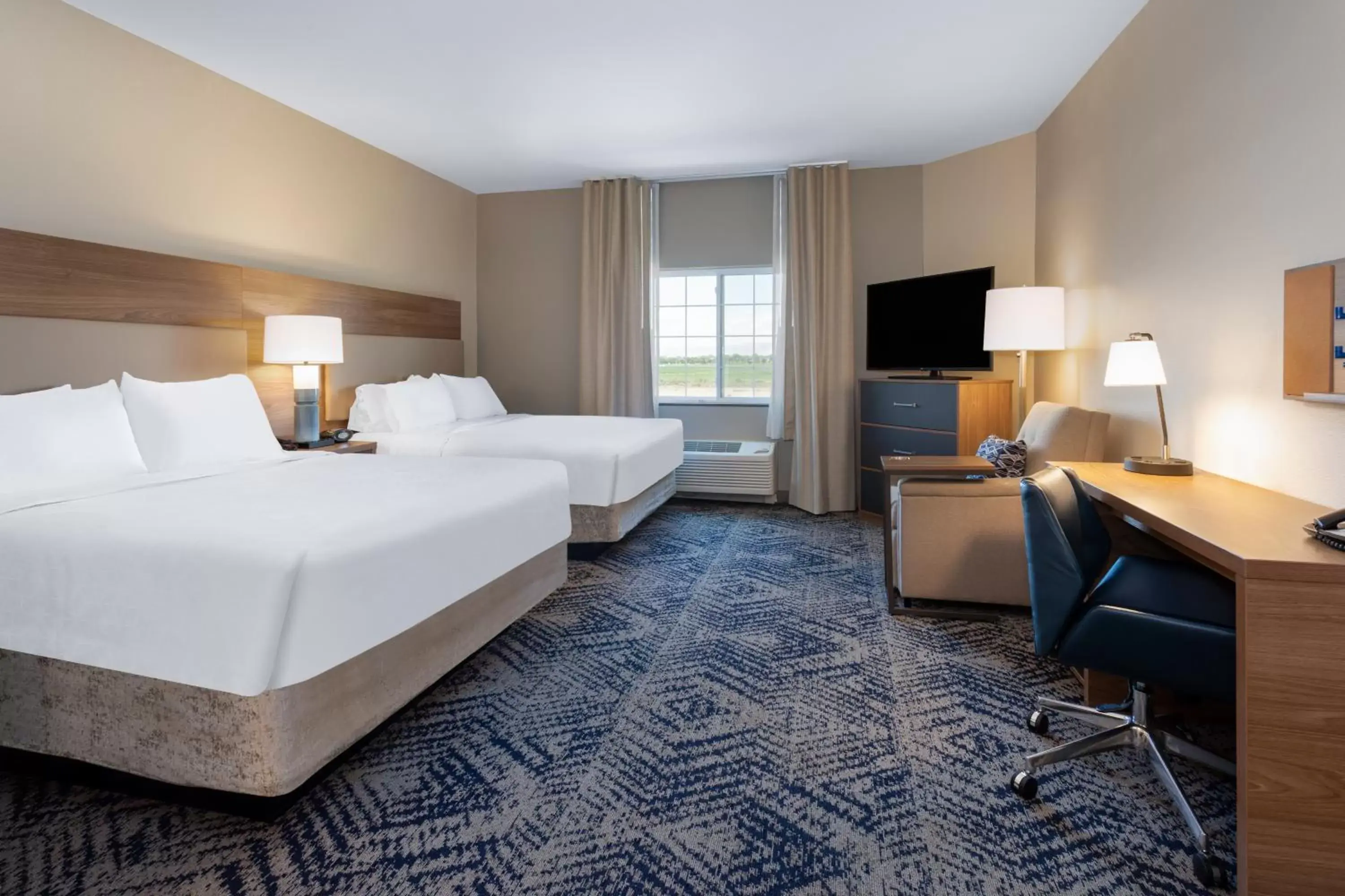 Bed in Candlewood Suites Grand Junction by IHG Bed in Candlewood Suites Grand Junction by IHG