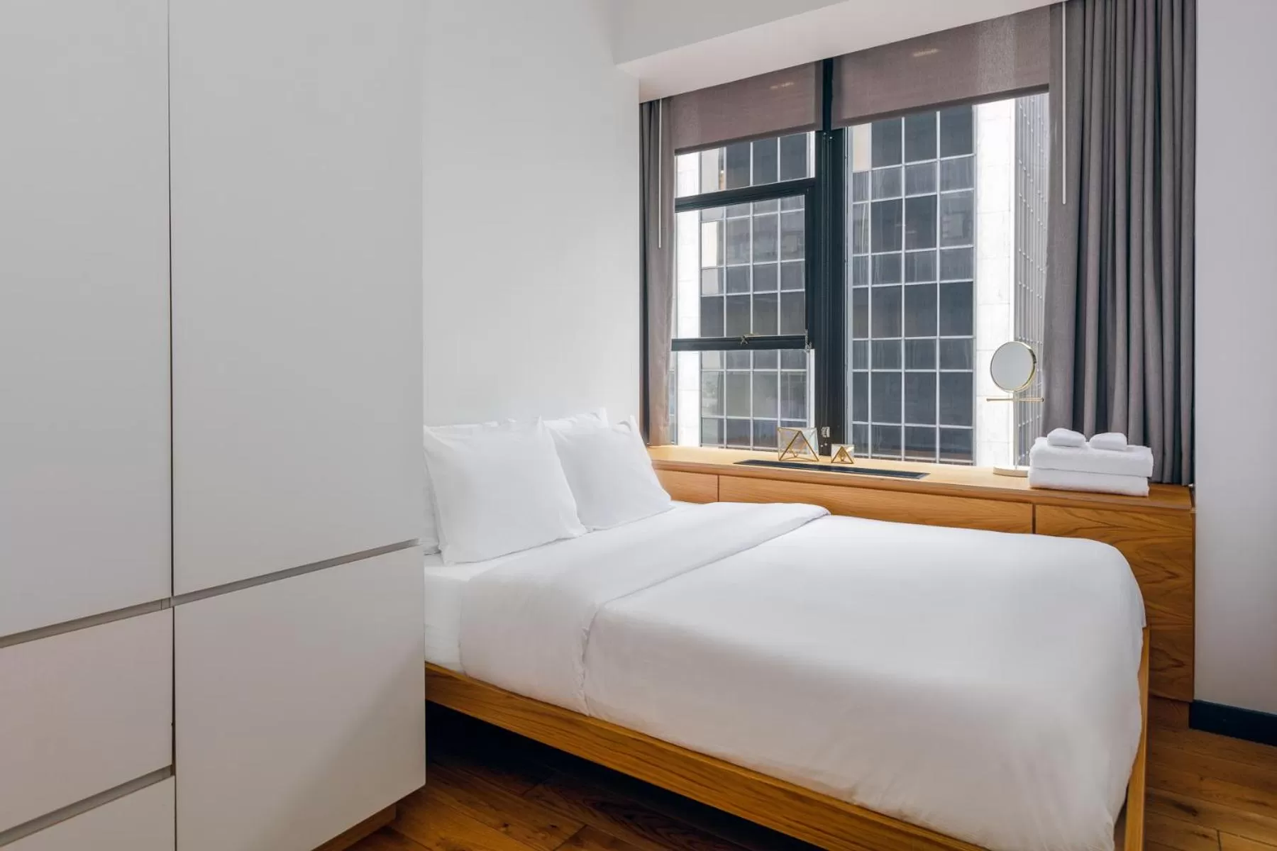 Bed in Placemakr Wall Street