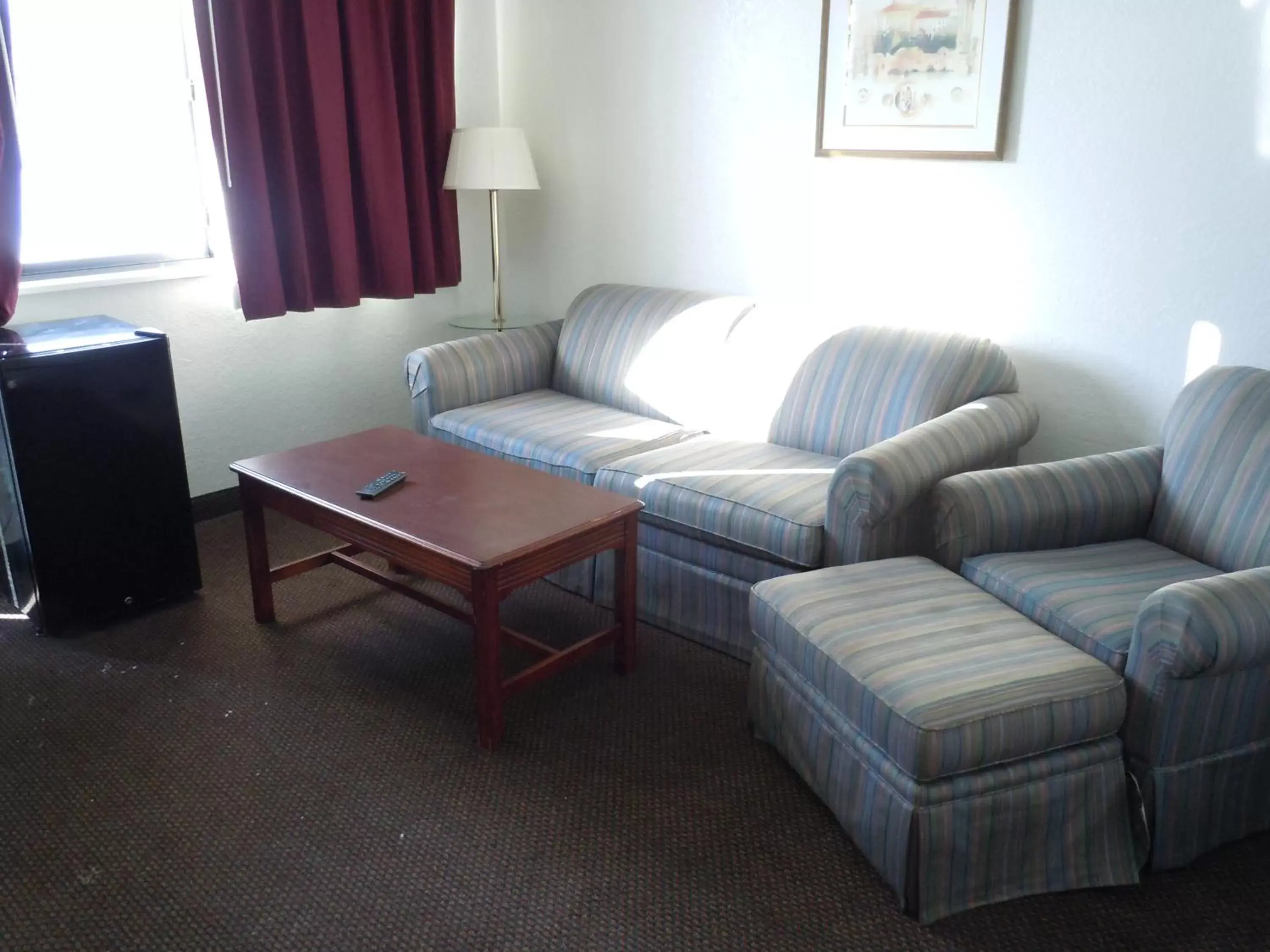 Day, Seating Area in Travelodge by Wyndham Grand Rapids North