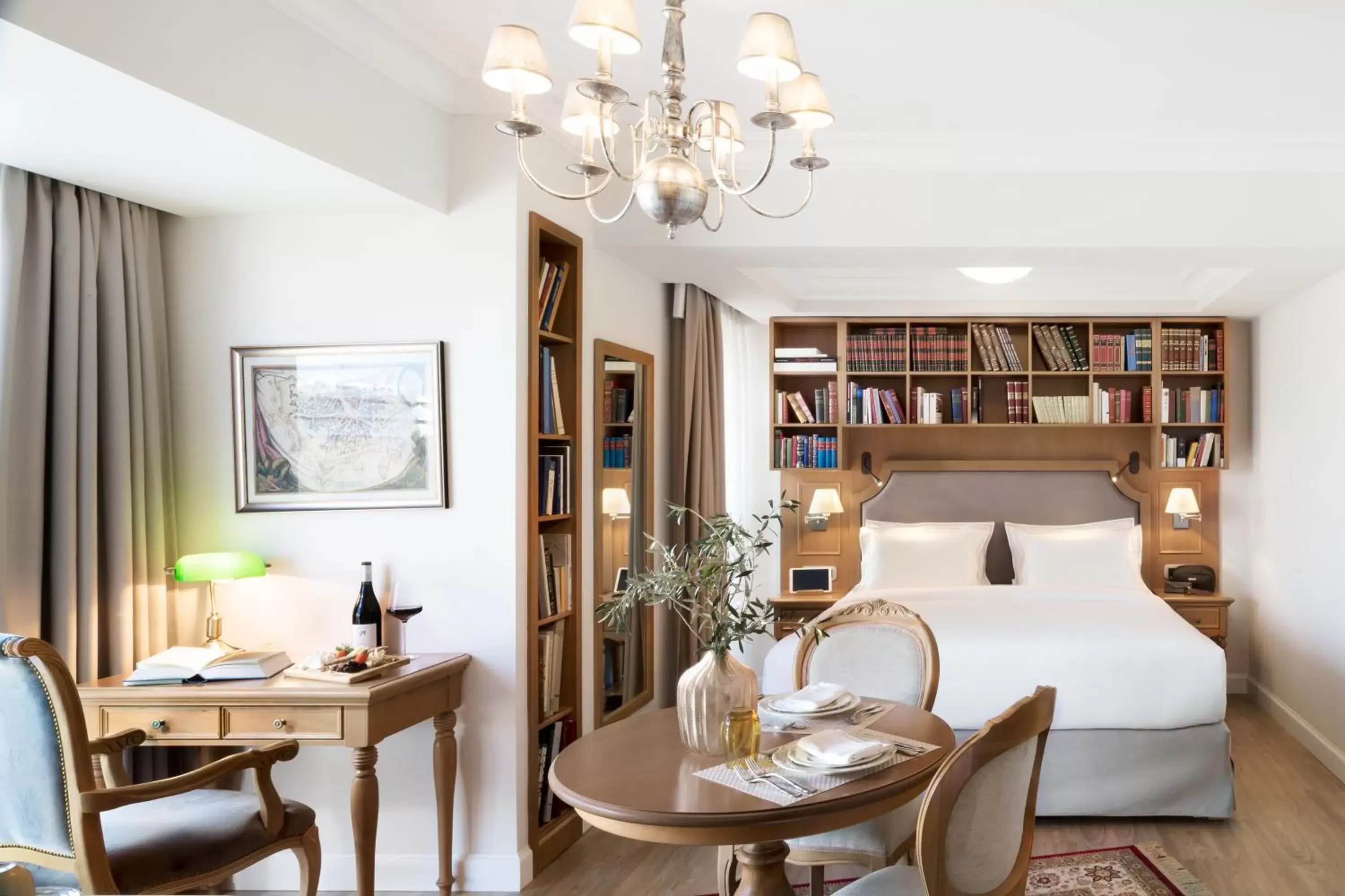 Bed, Dining Area in Legacy Gastro Suites