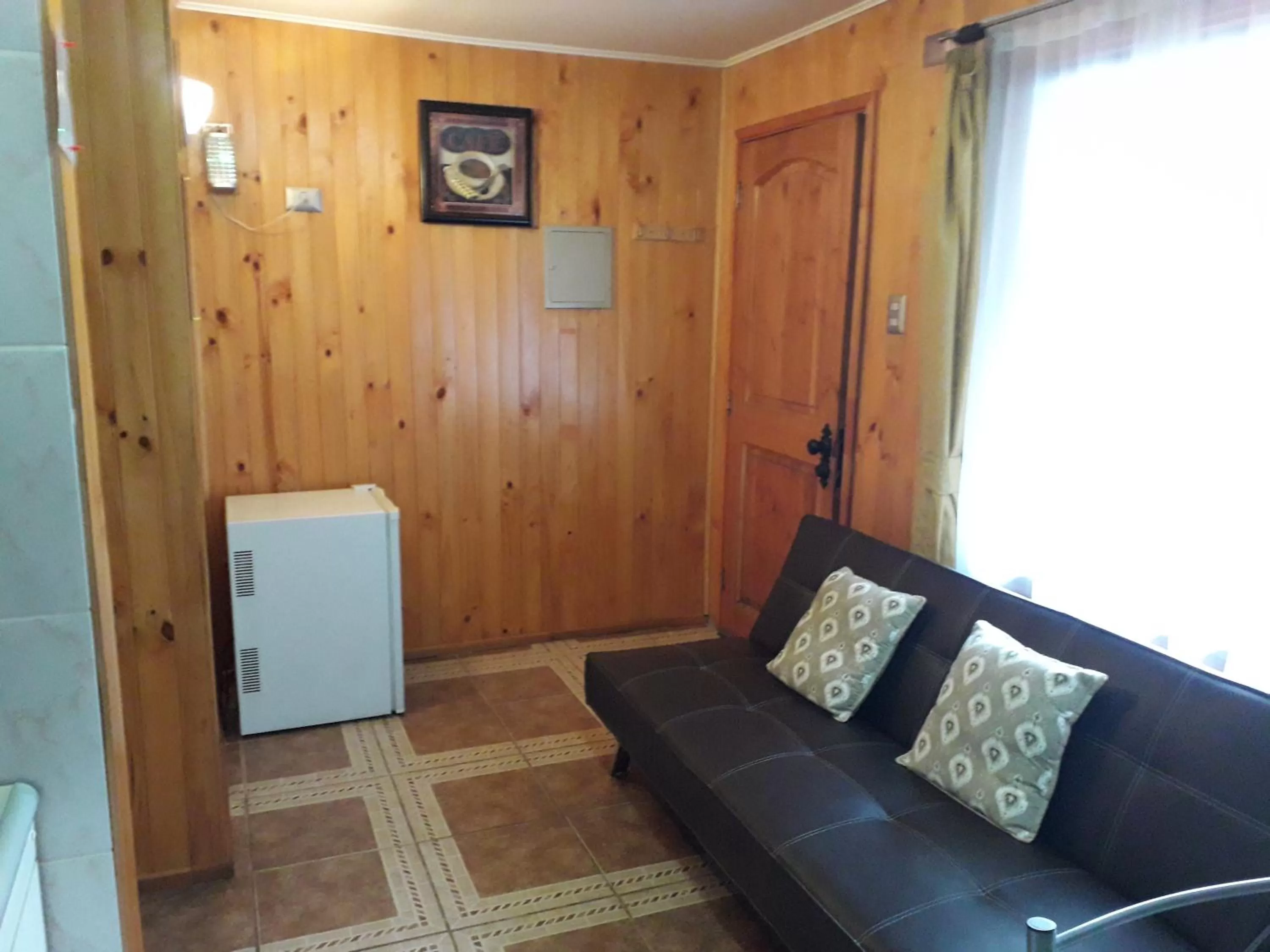 Living room in Apart-Hotel Colonia-Königsberg UBICADO COSTADO TERMINAL BUSES, RÍO CALLE CALLE CARABINEROS DEPARTAMENTOS COMPLETOS CON AIRE ACONDICIONADO Y ESTACIONAMIENTO