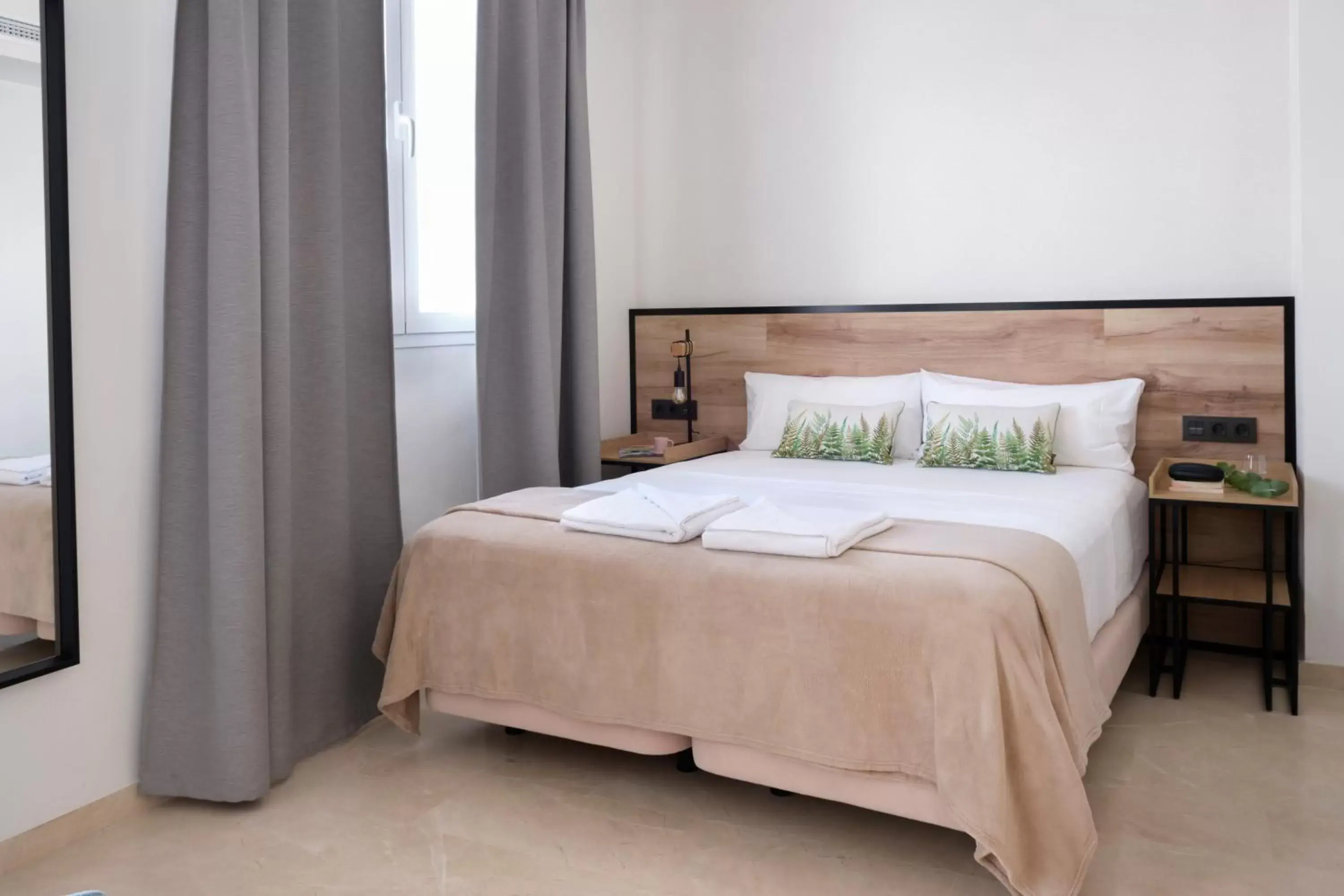Bed in Sweet Sevilla Suites