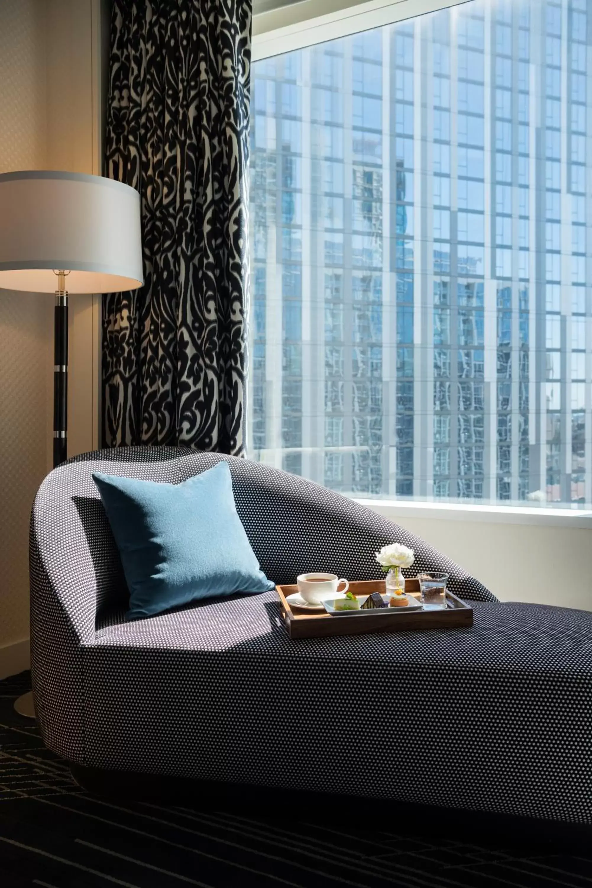 Living room, Bed in Sofitel Chicago Magnificent Mile