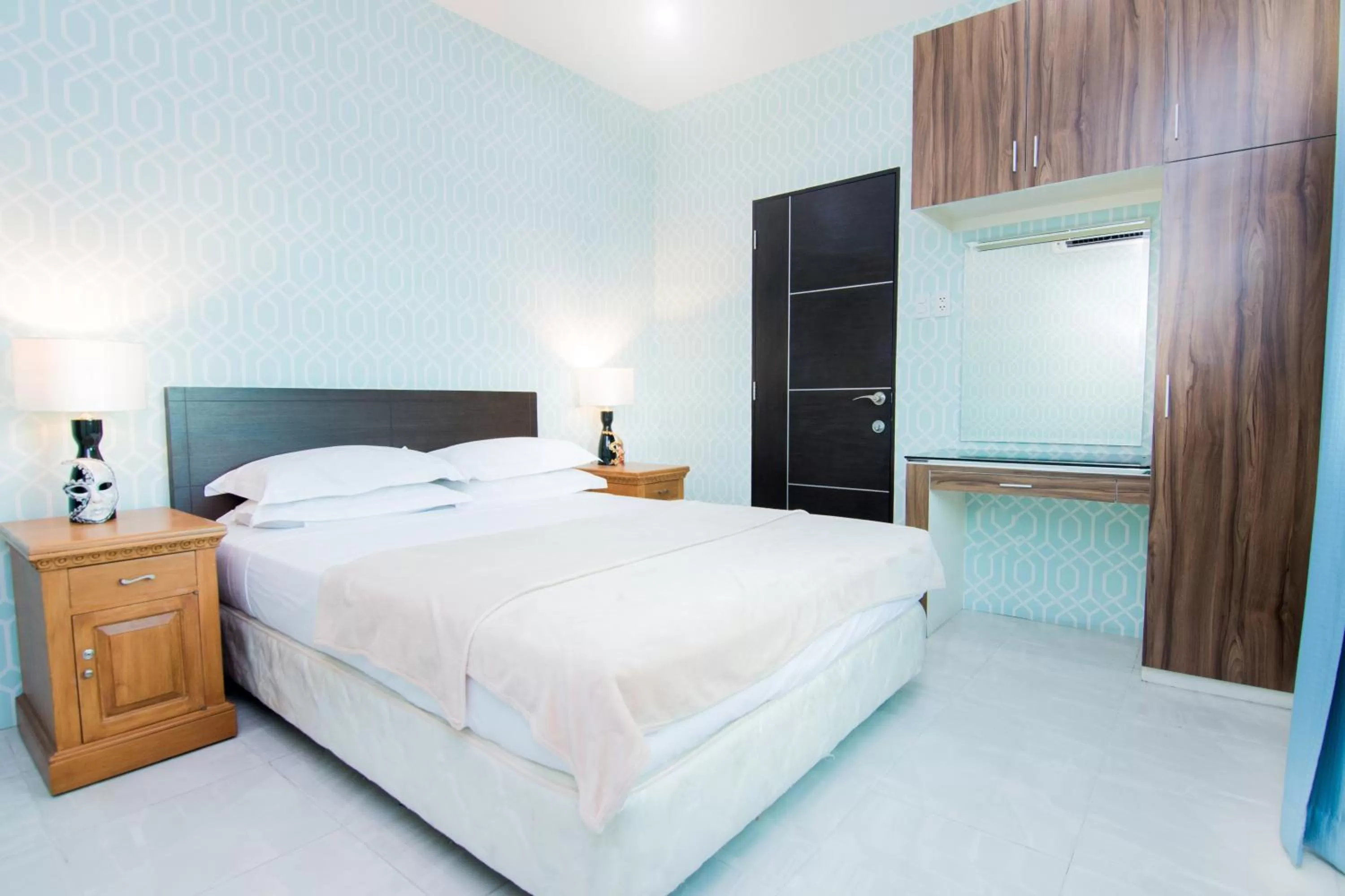 Bed in Apollonia Royale Hotel