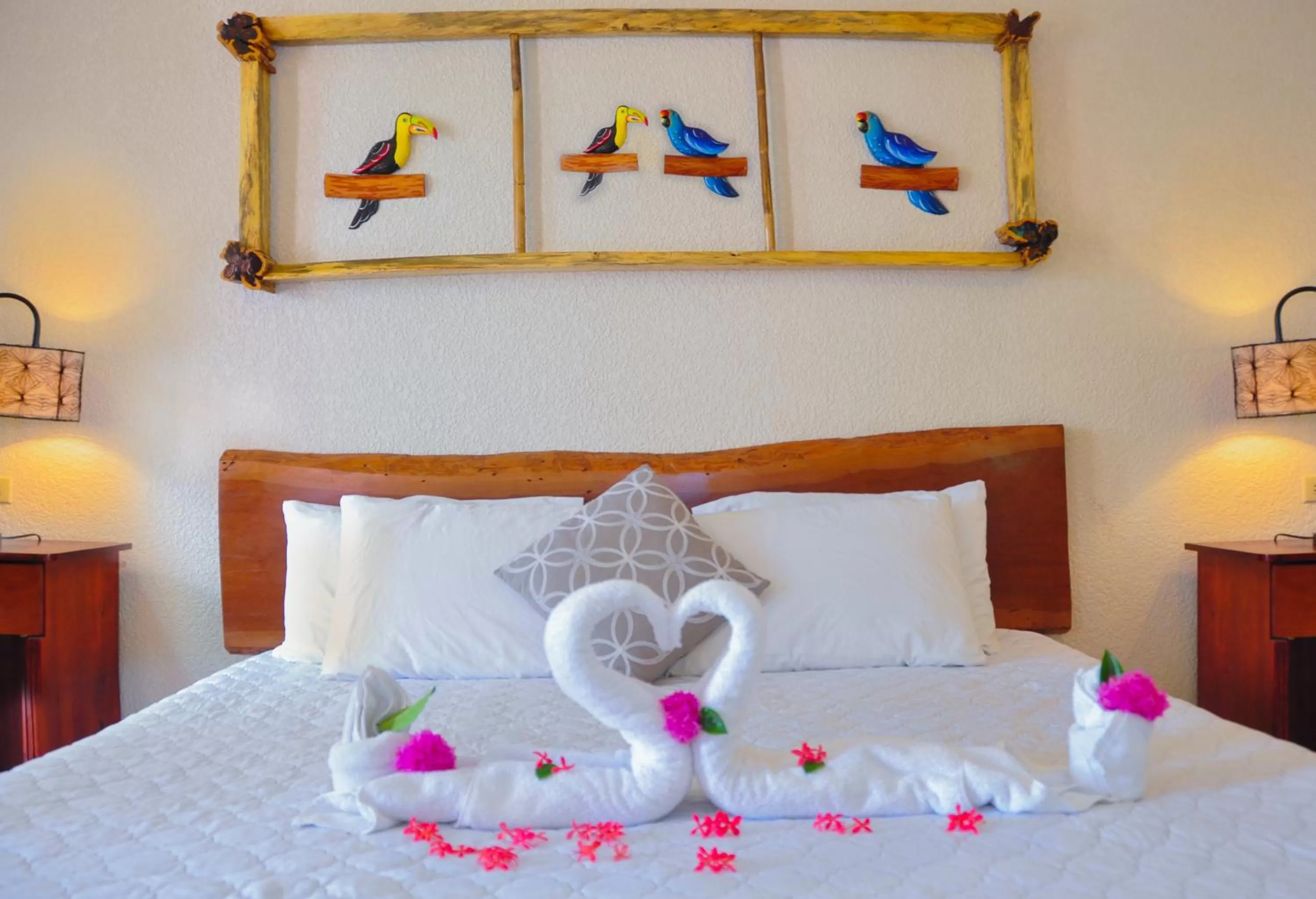 Bed in Lamanai Hotel & Marina