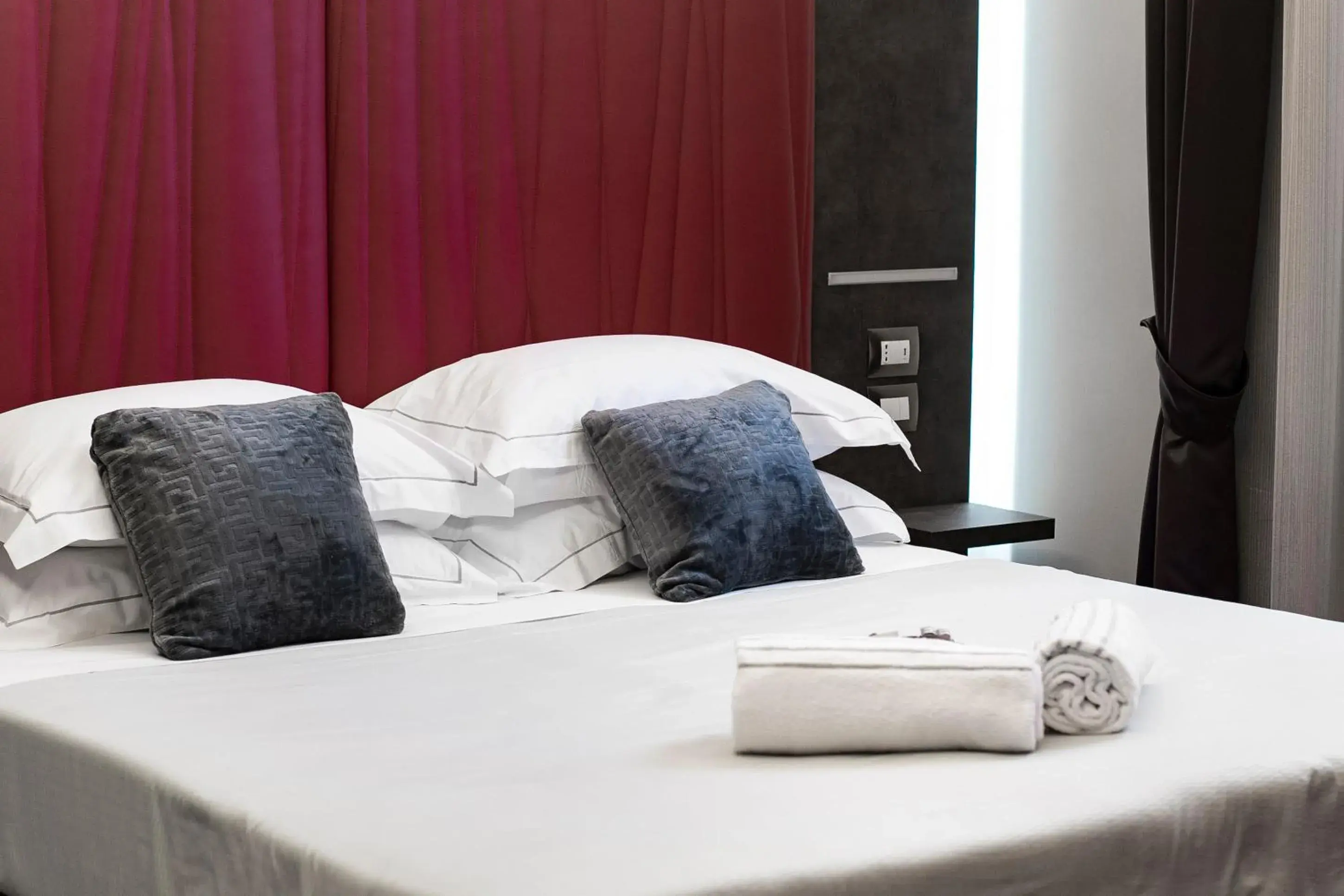 Bed in Artemide Guest House