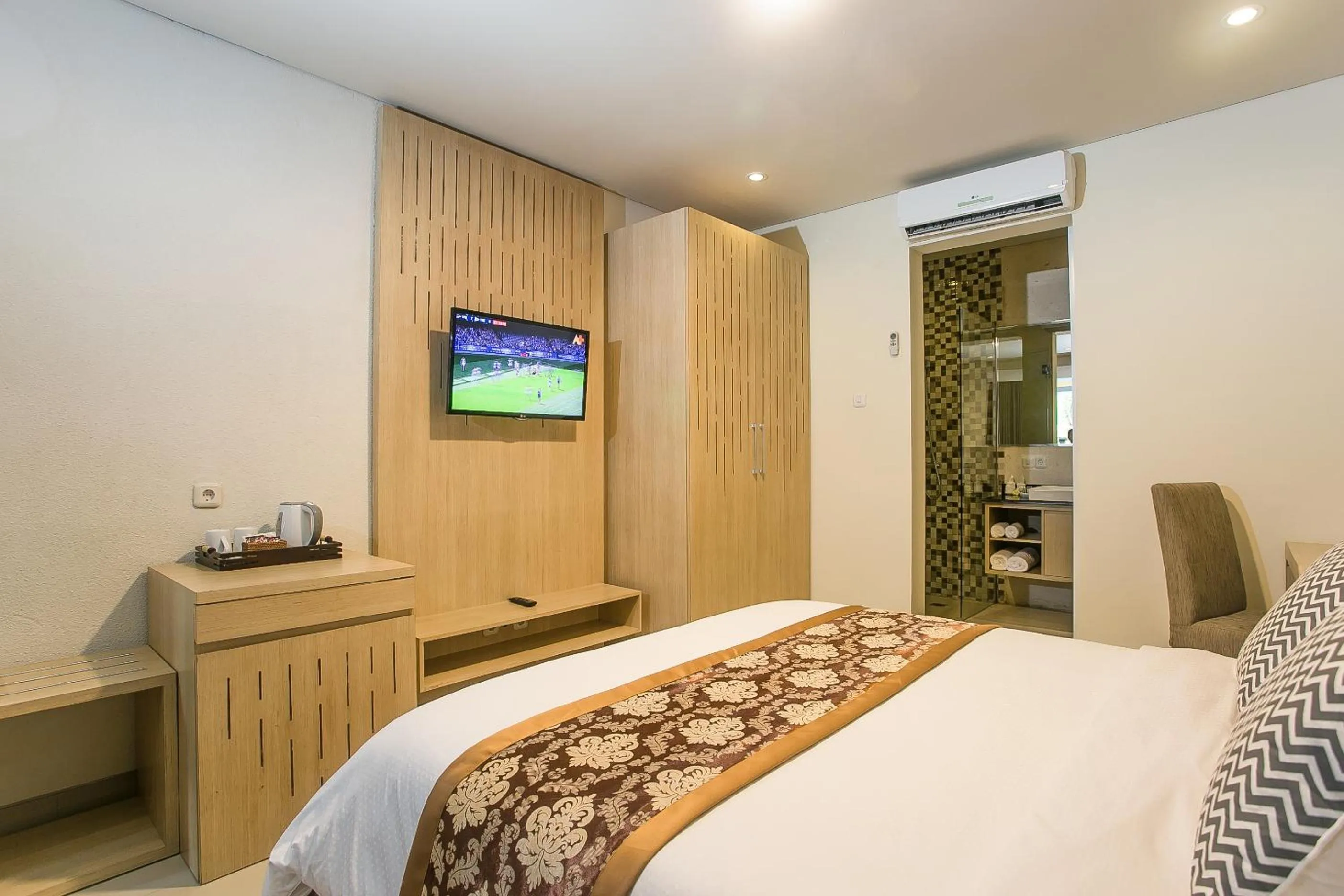 Bed in Mahalaksmi Boutique Hotel