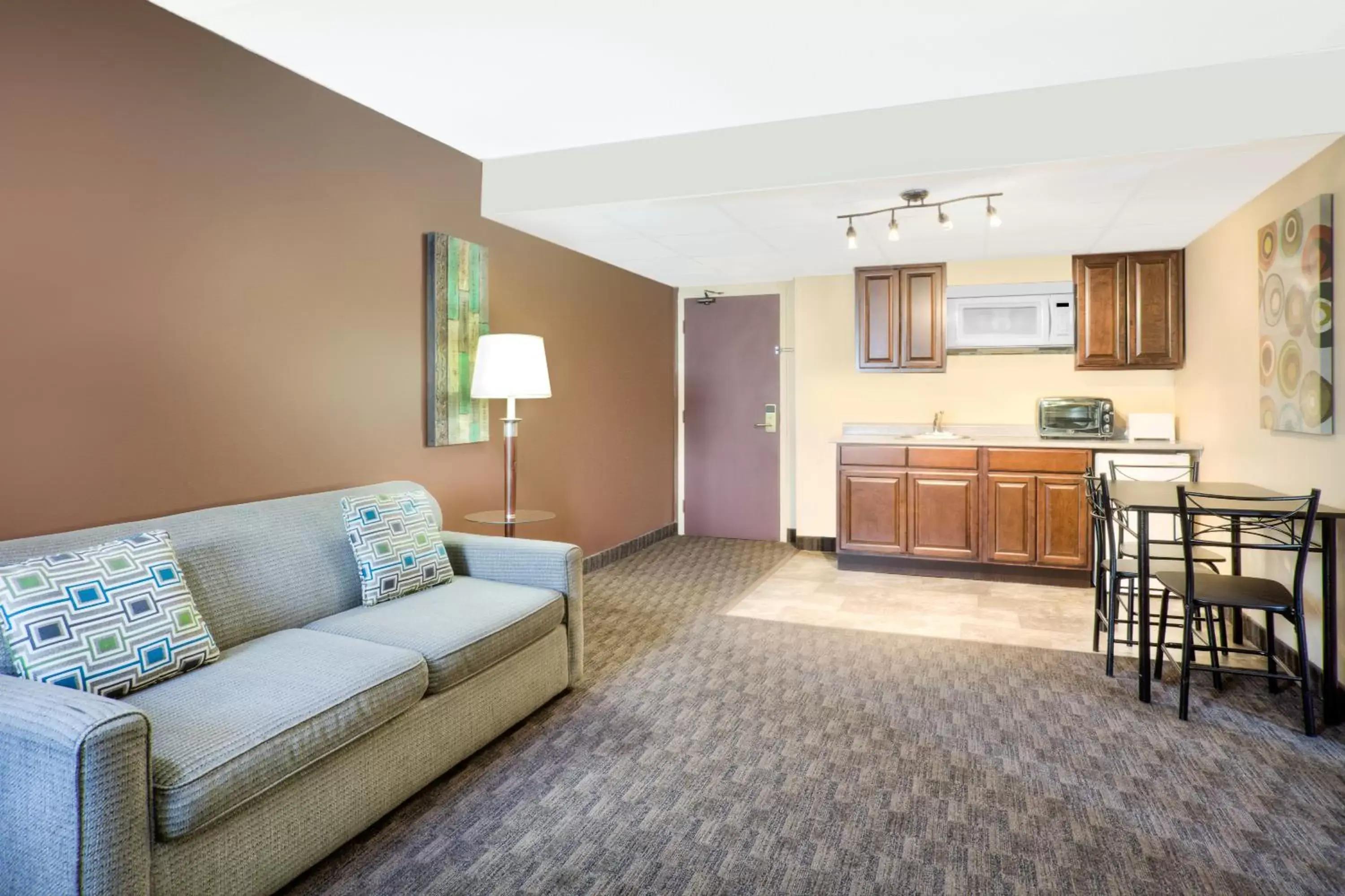 Shower, Seating Area in Travelodge by Wyndham Miramichi New Brunswick