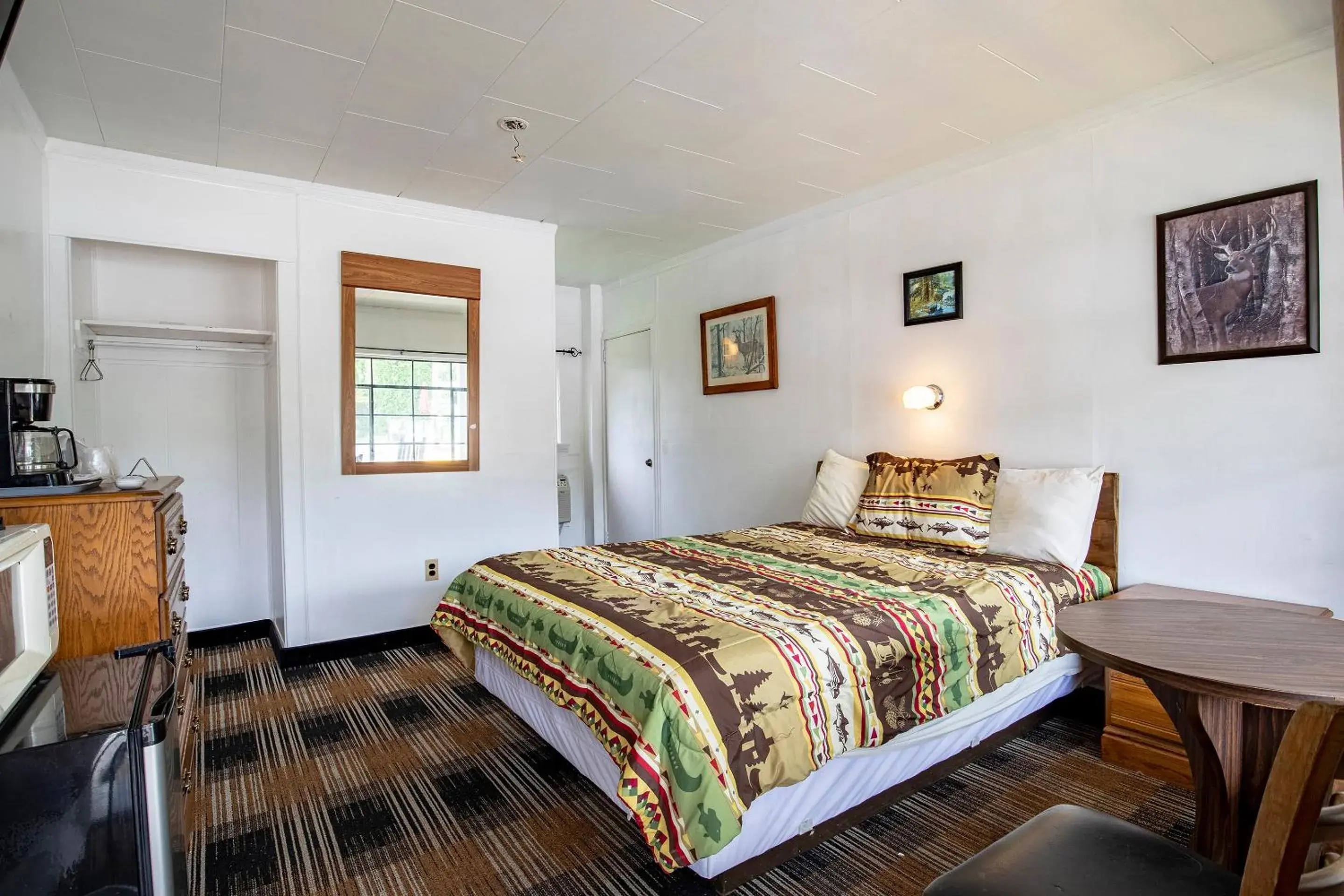 Bedroom, Bed in Lloyd's On The River Country Inn By Oyo