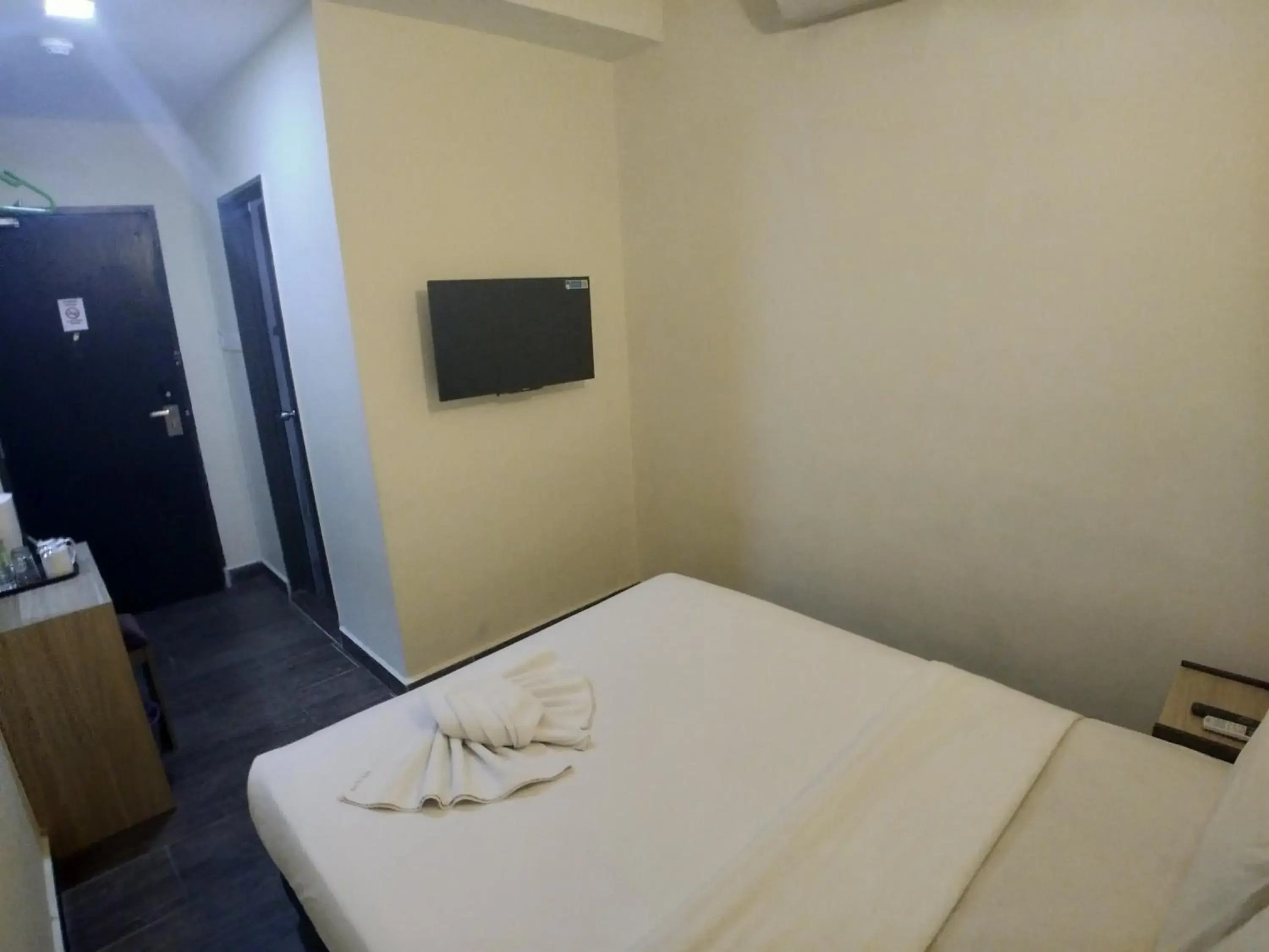 Communal lounge/ TV room, Bed in Hotel Westree KL Sentral