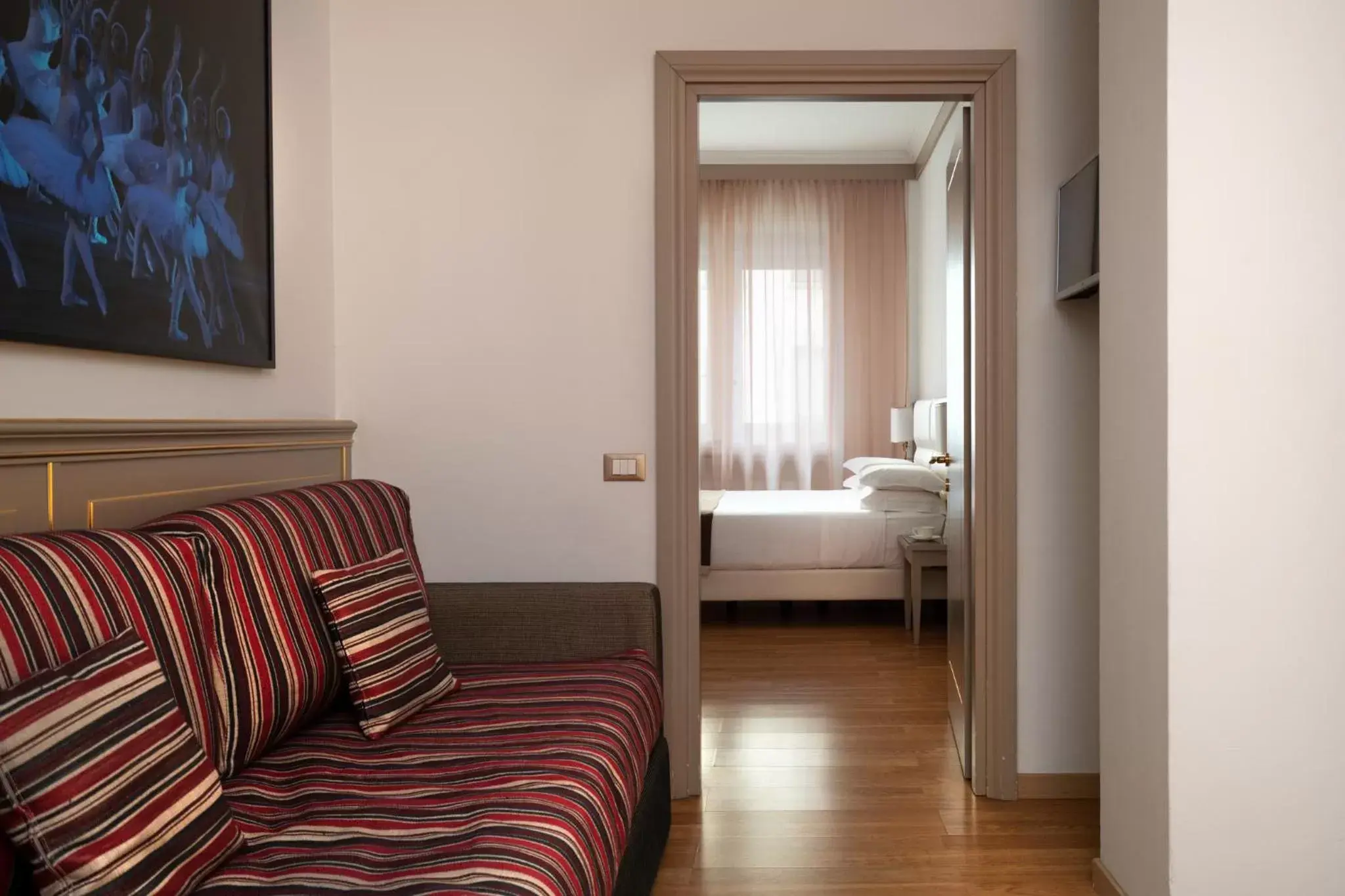 Bed, Seating Area in Palazzo Porta Romana Hotel