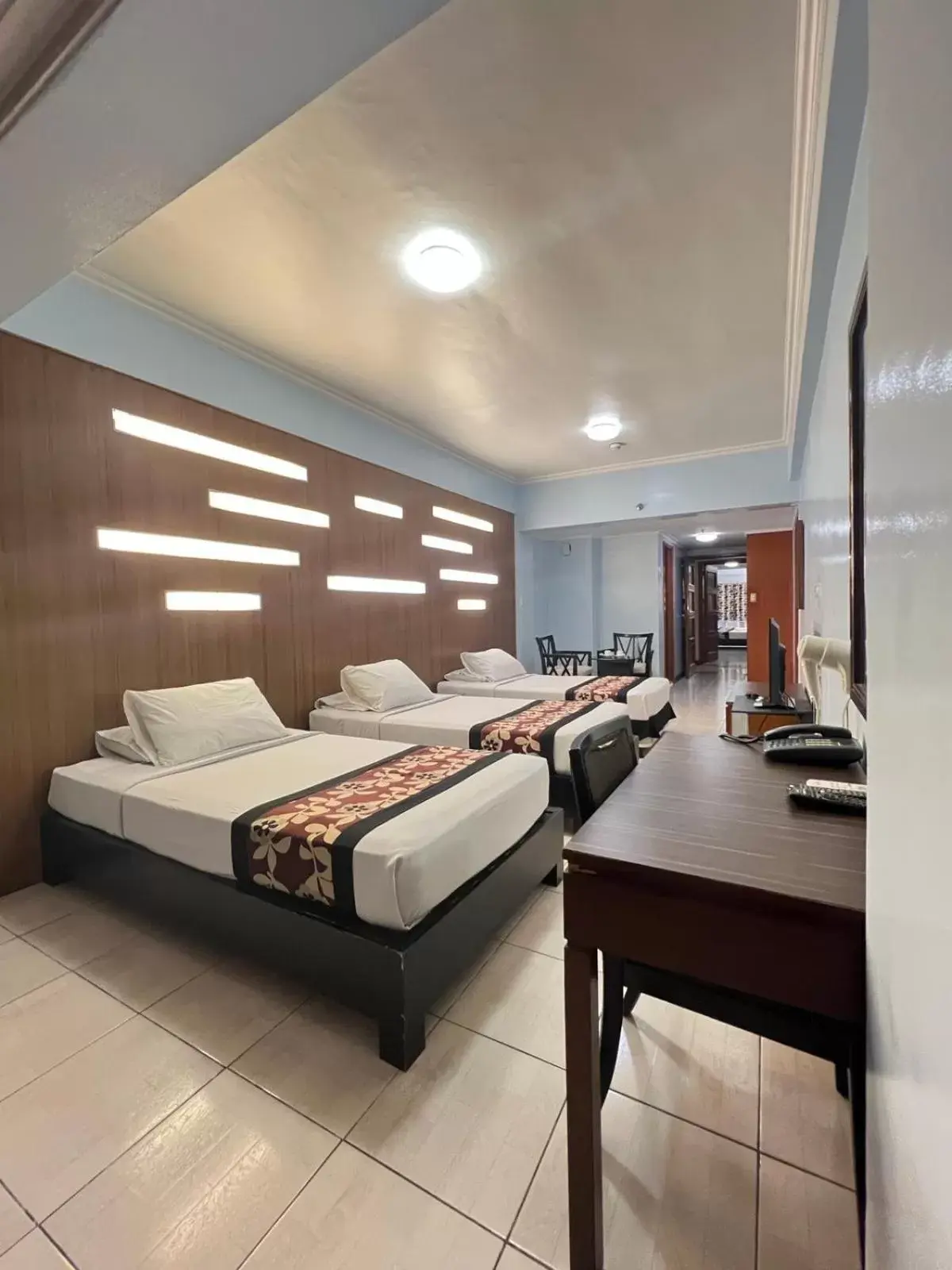 Bed in Jupiter Suites