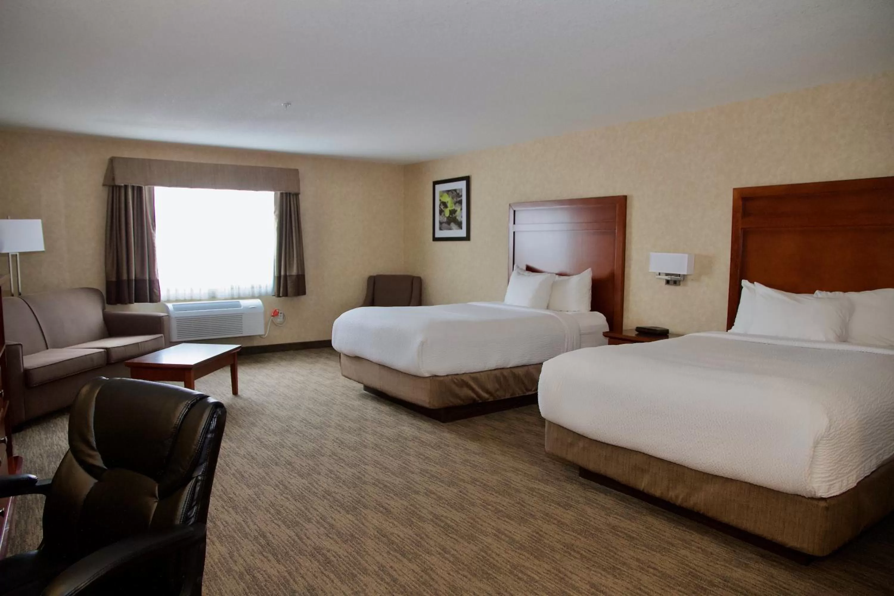 Photo of the whole room, Bed in Days Inn & Suites by Wyndham Brooks