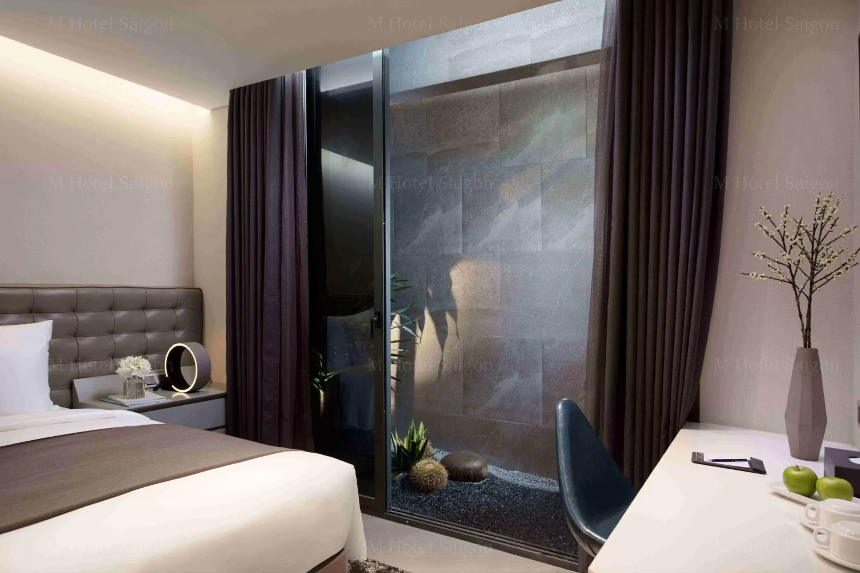 View (from property/room), Bed in M Hotel Saigon View (from property/room), Bed in M Hotel Saigon