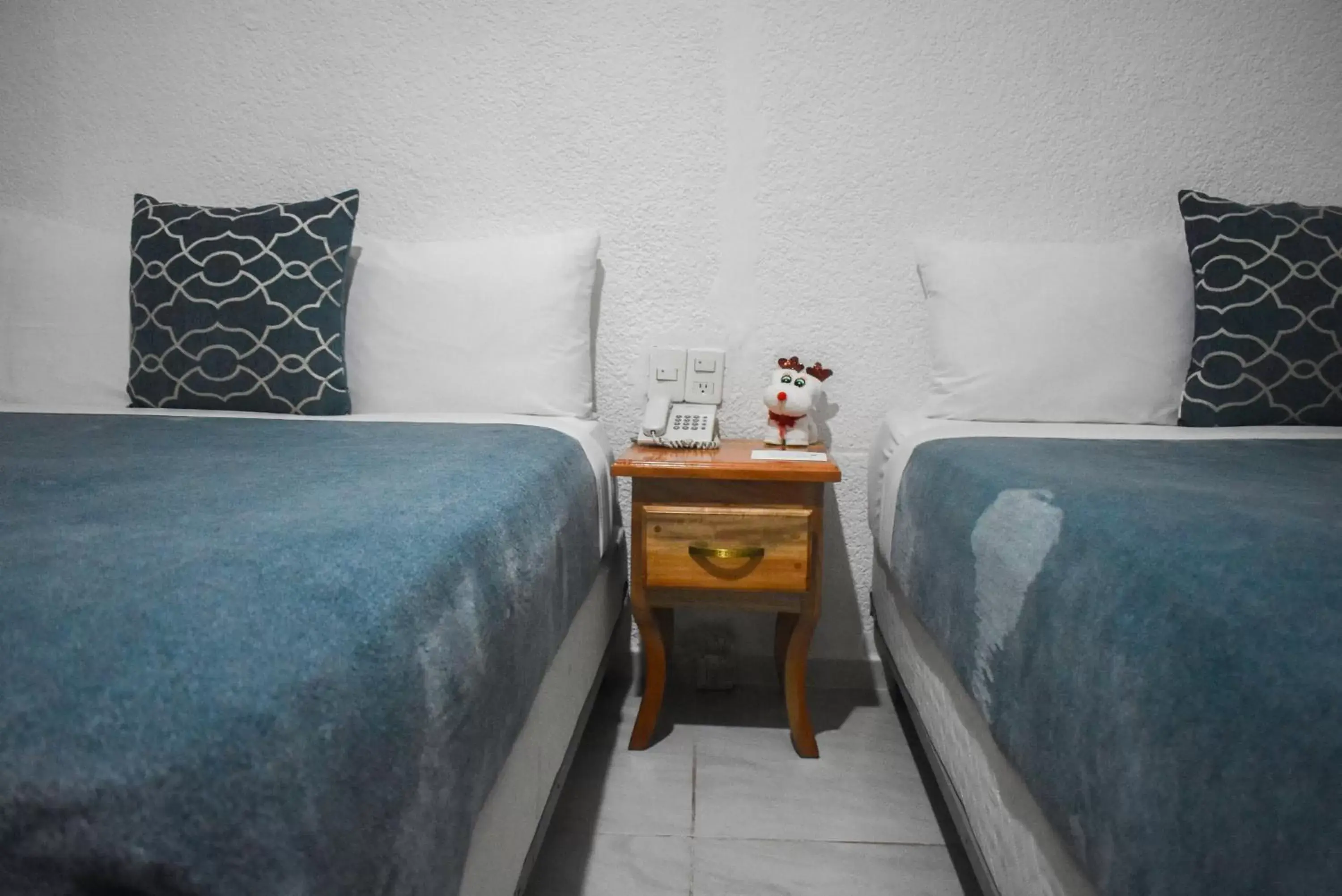 Bed in Hotel Maria de Lourdes