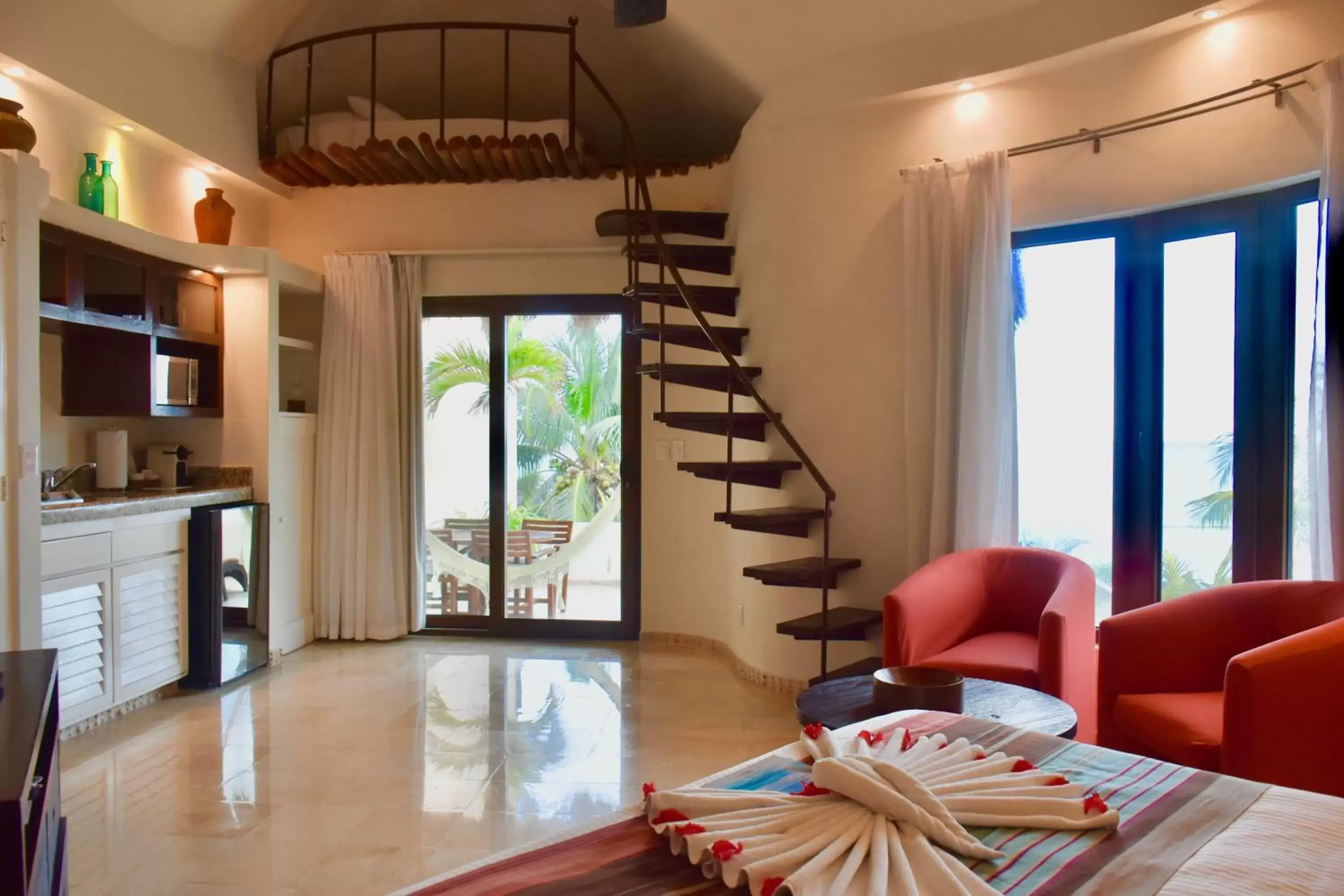 Coffee/tea facilities, Seating Area in Playa Palms Beach Hotel