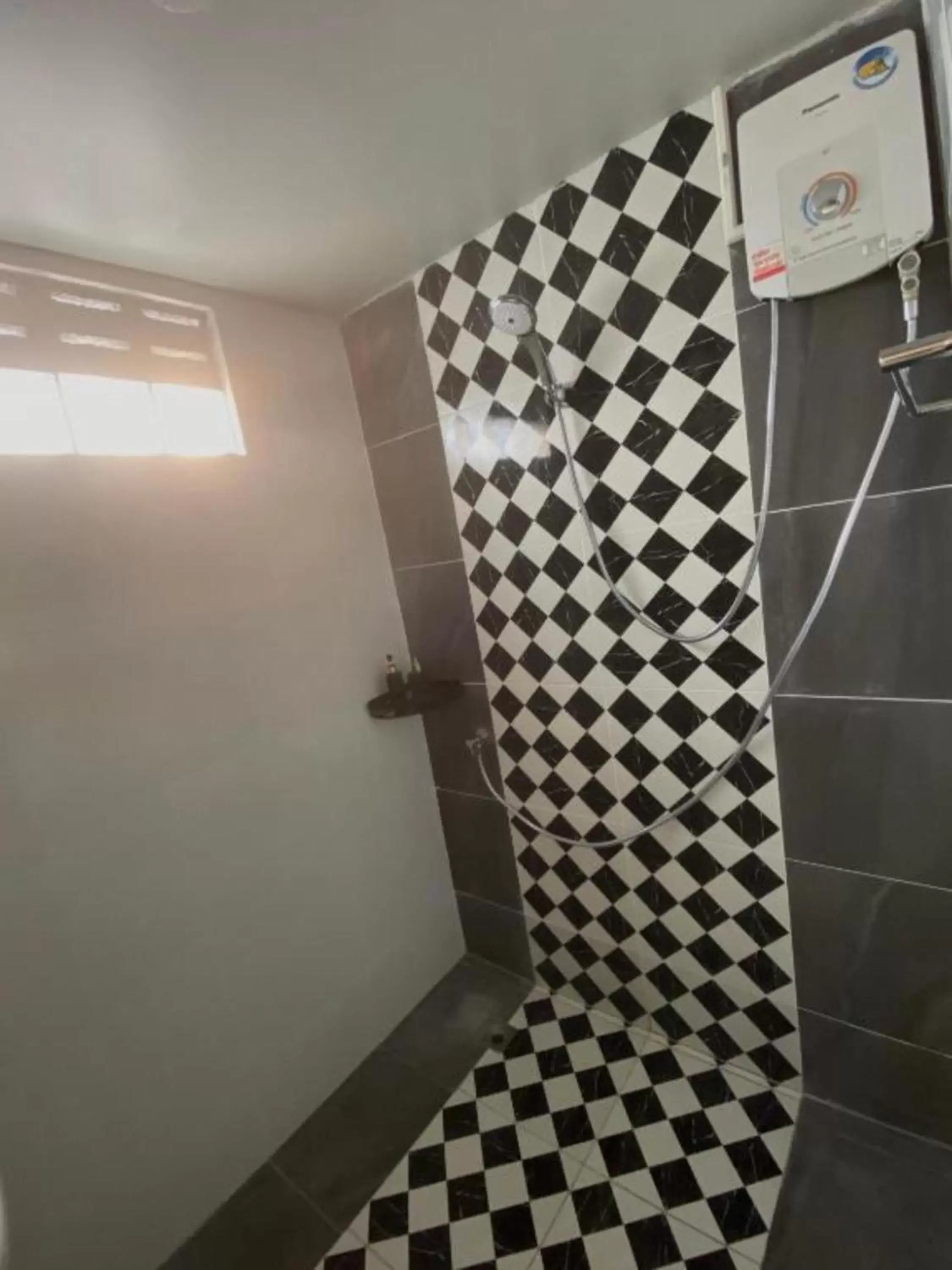 Bathroom in Pai Sukhothai Resort SHA Extra Plus