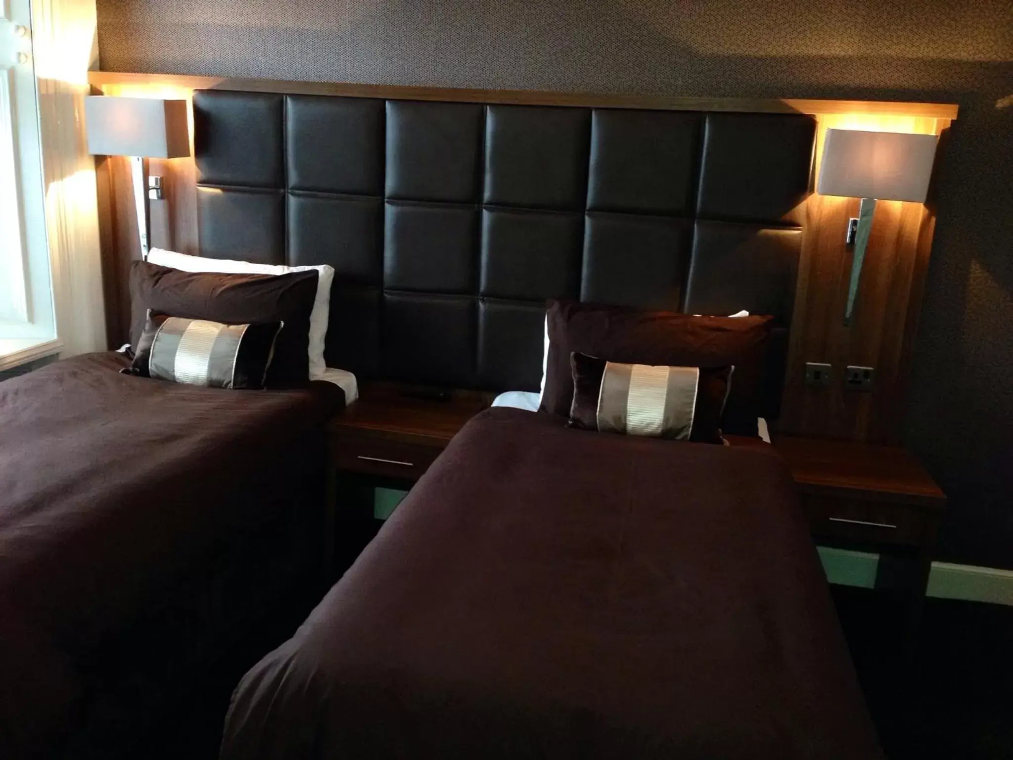 Bed, Seating Area in The Fort Hotel