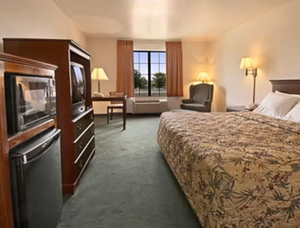 Bed in Prime Inn & Suites Poteau