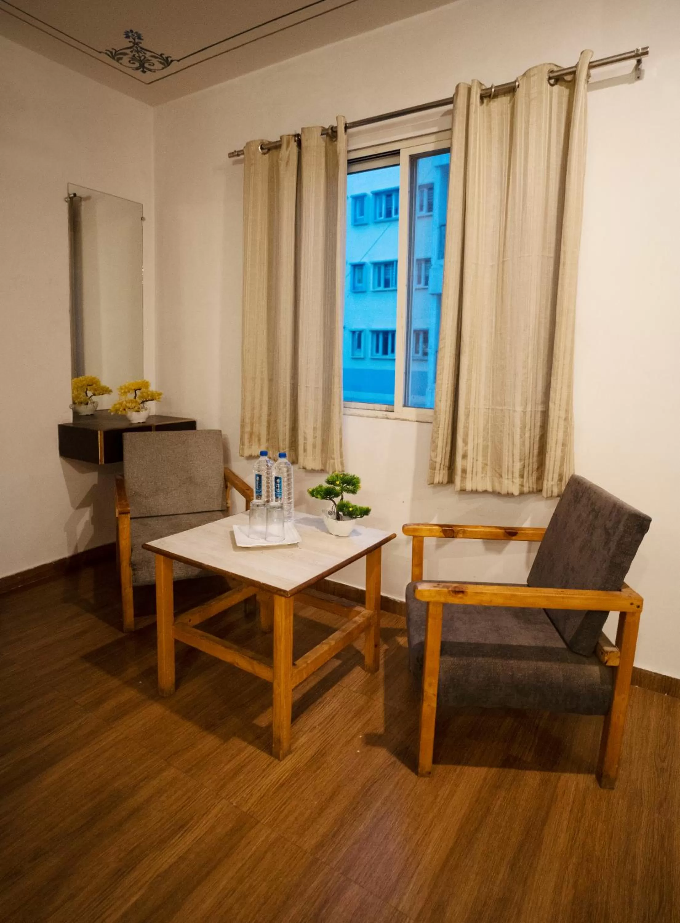 Seating area in Tripli Hotels Arunoday Palace