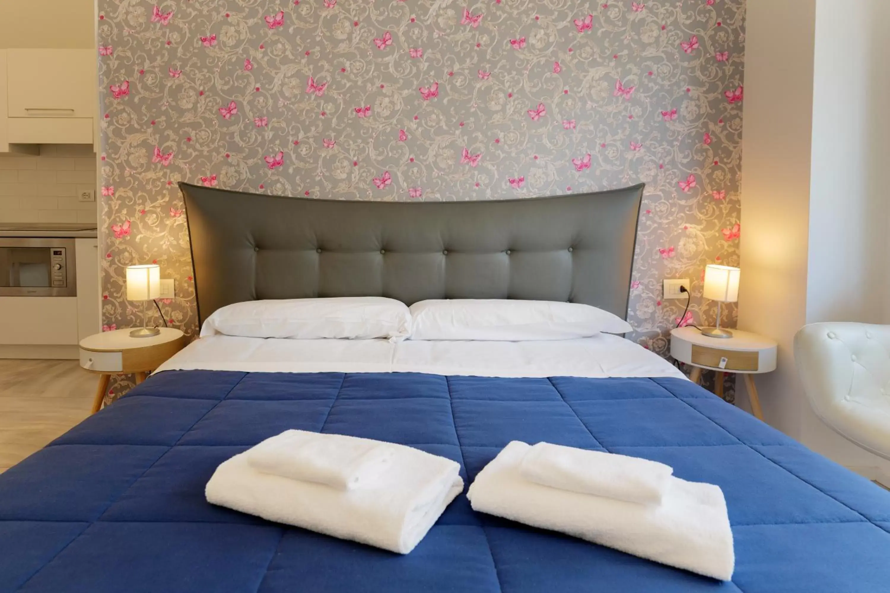 Bed in Relais Vittorio Veneto - Luxotel & Apartotel