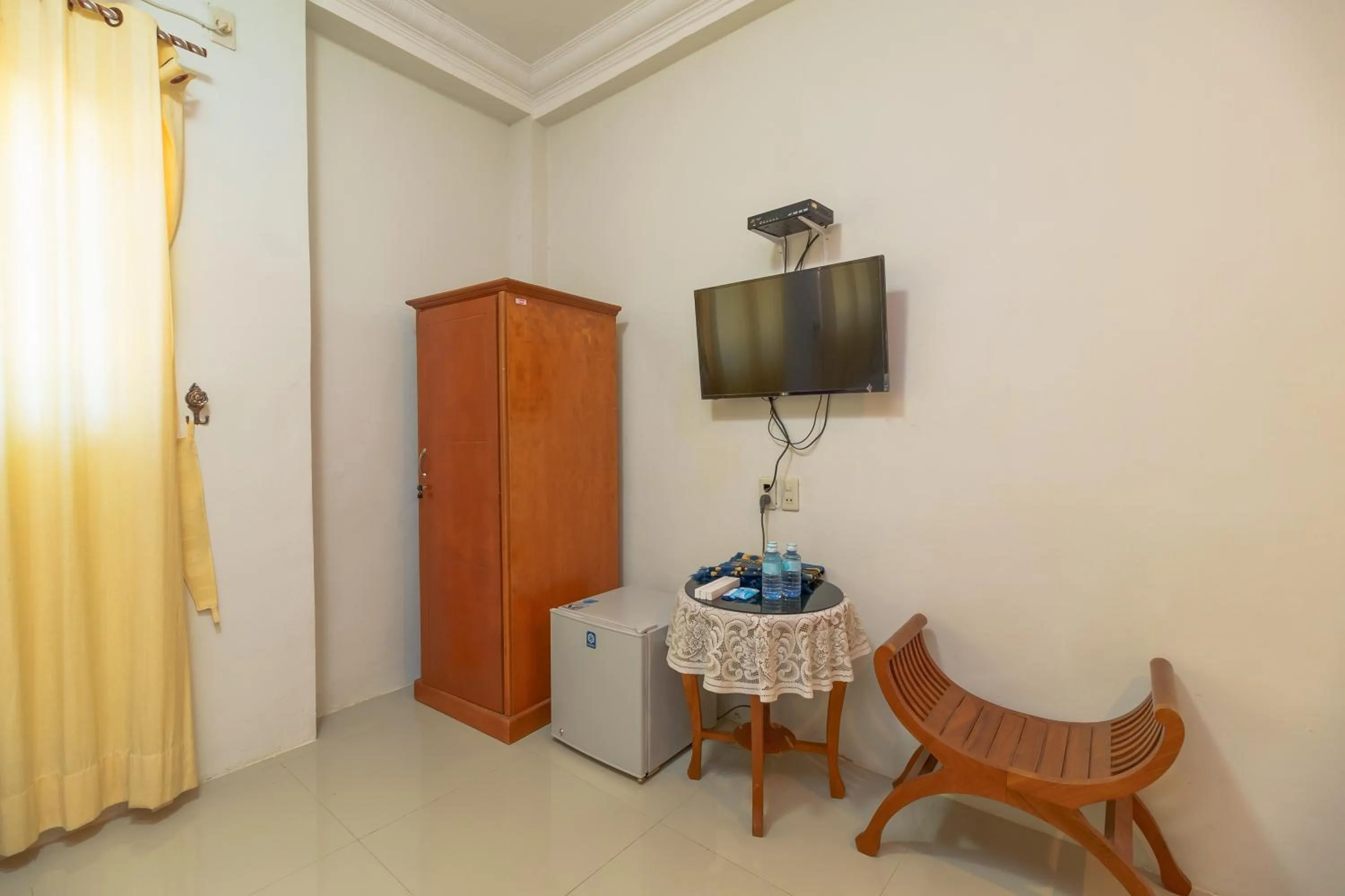 Living room in RedDoorz Syariah @ Panglima Nyak Makam Aceh