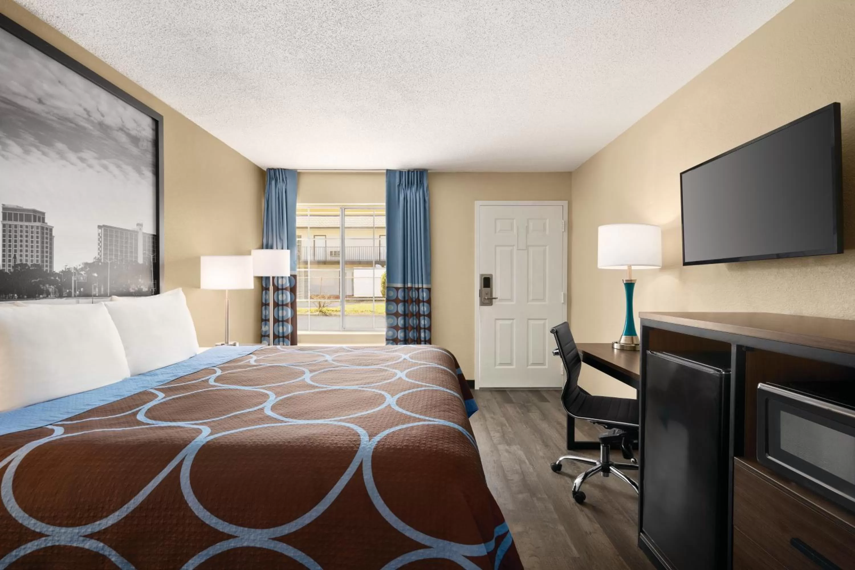 Photo of the whole room, Bed in Super 8 by Wyndham Gulfport Airport NW Near Biloxi