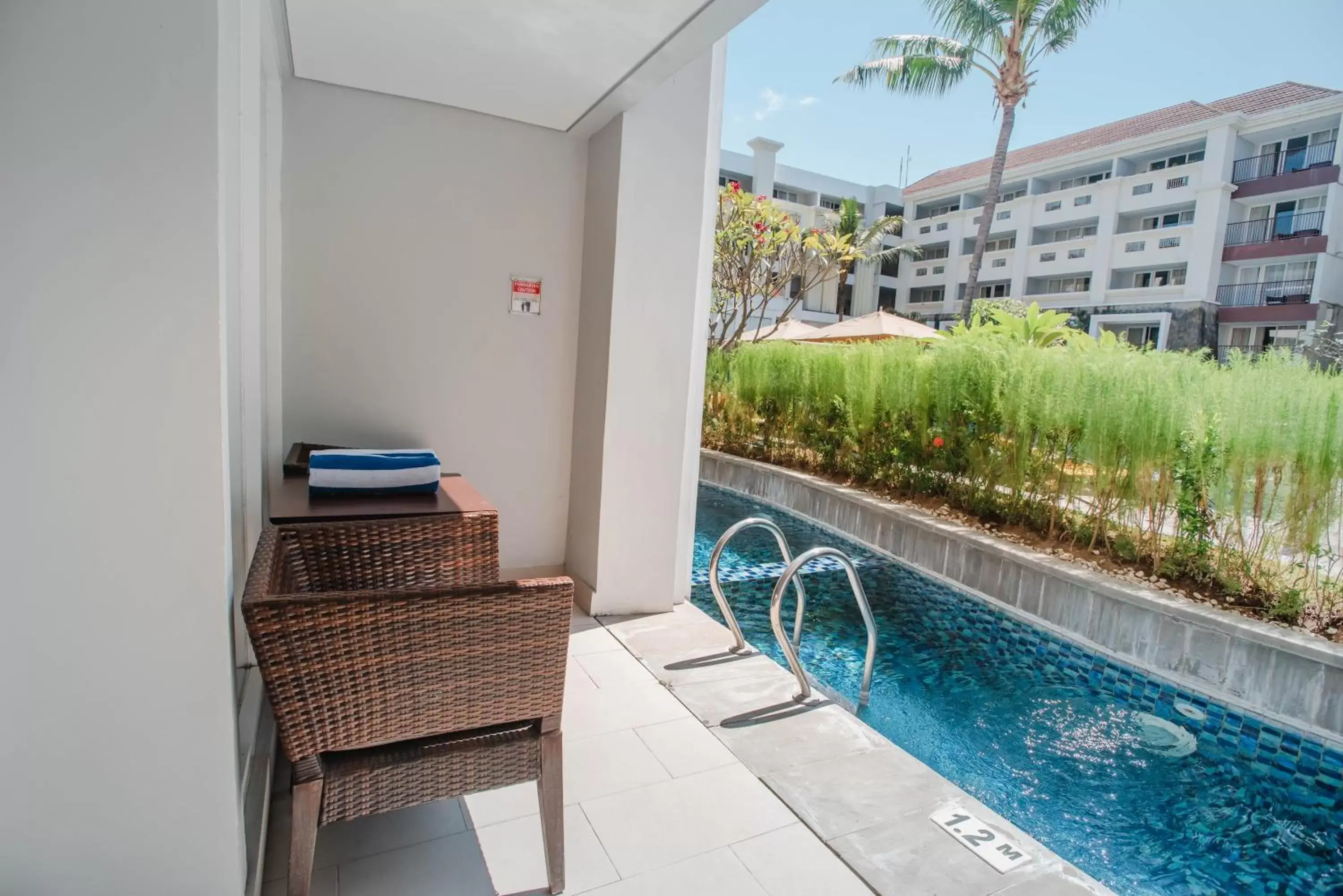 Swimming Pool in Swiss-Belresort Watu Jimbar Swimming Pool in Swiss-Belresort Watu Jimbar
