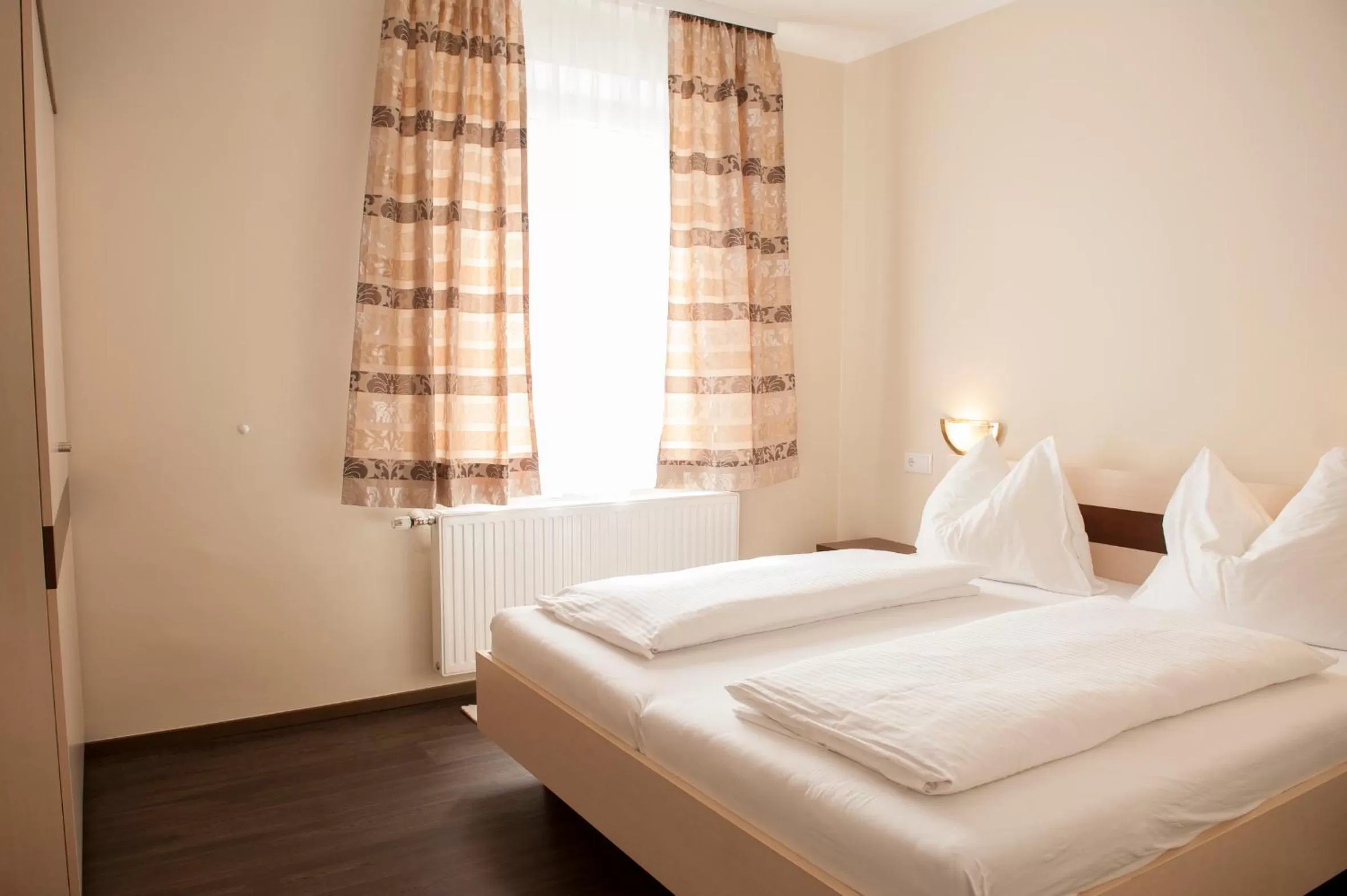 Bed in Hotel Guidassoni