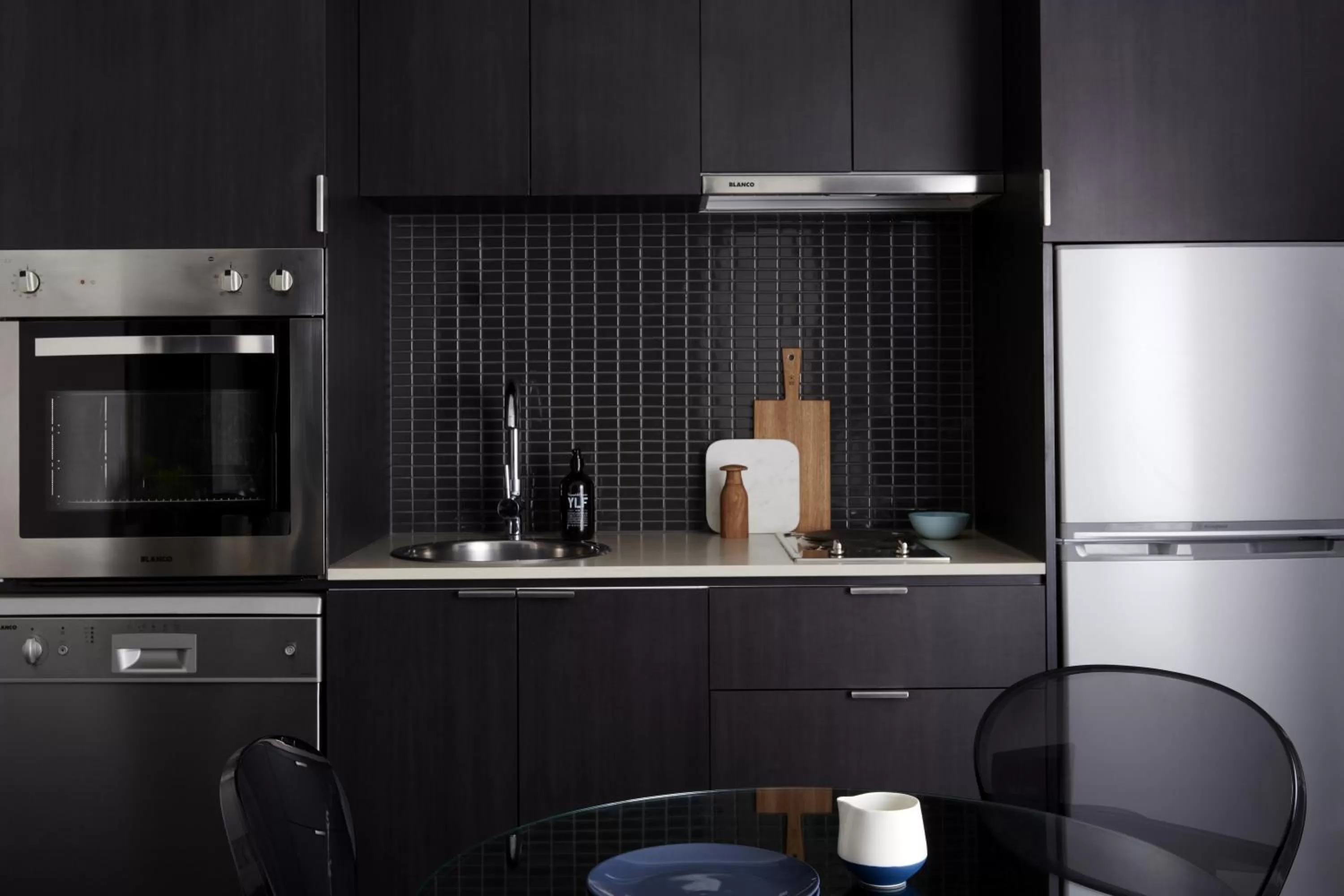 Kitchen or kitchenette in Punthill South Yarra Grand