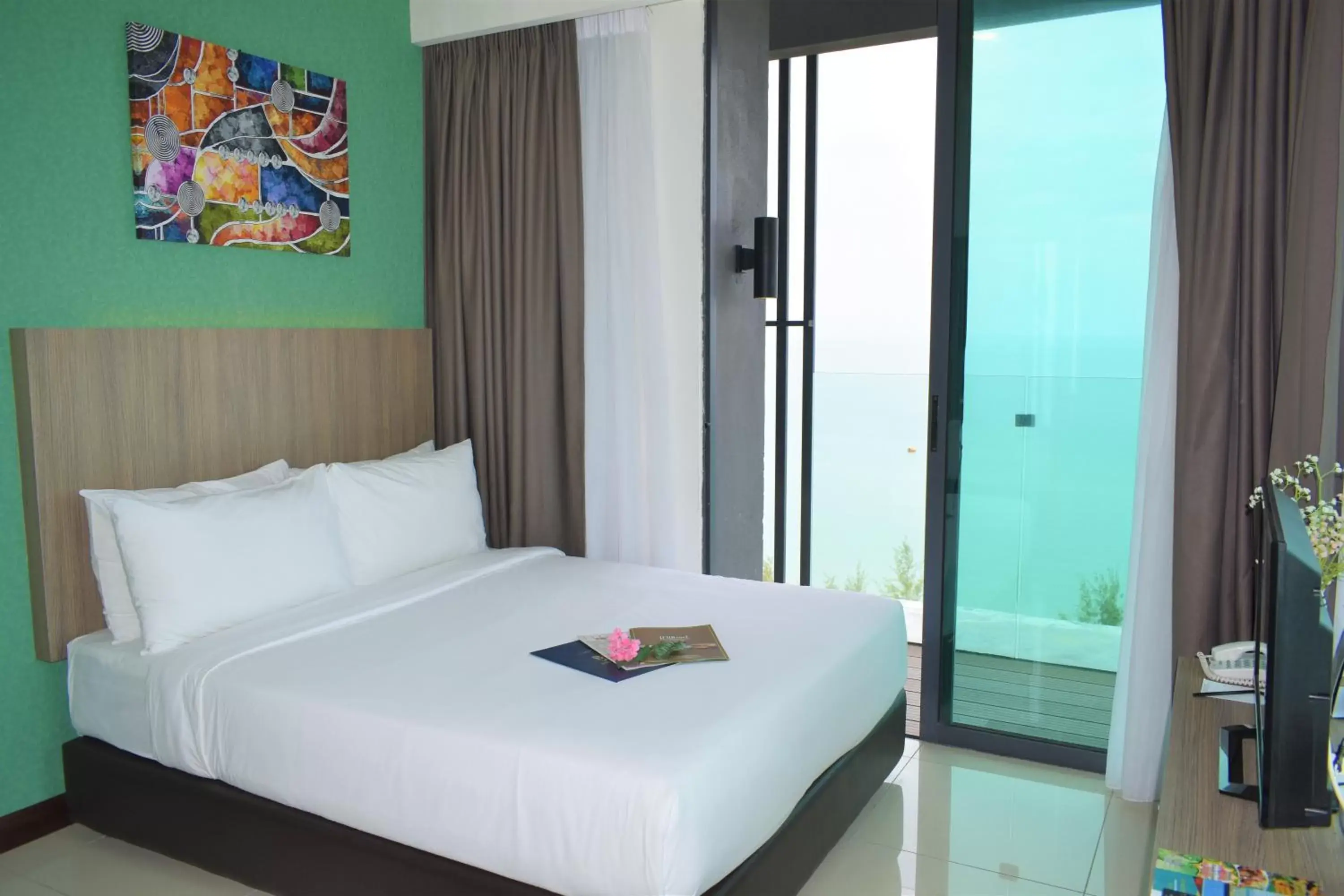 Bed in D'Wharf Hotel & Serviced Residence