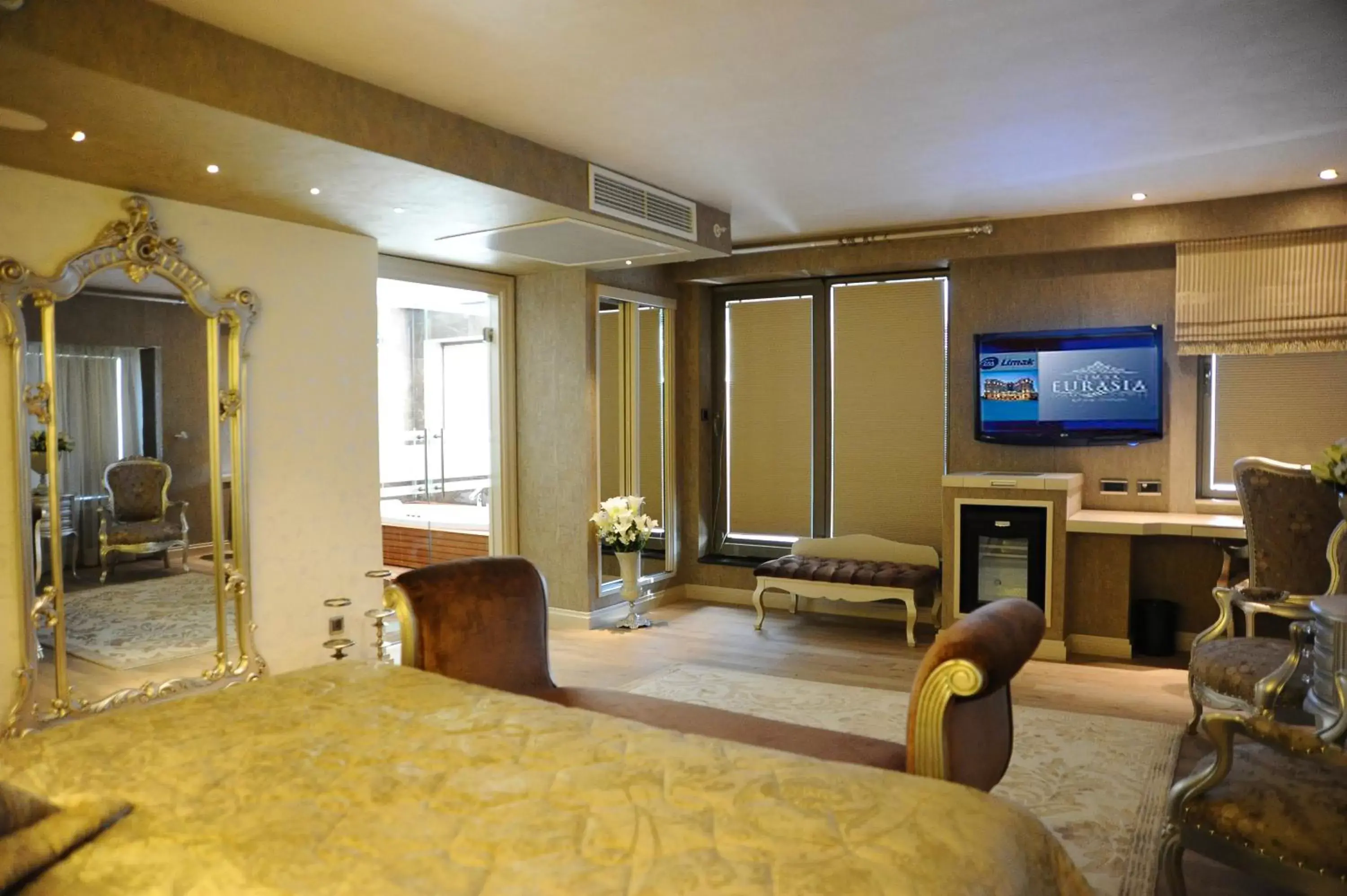 Photo of the whole room, TV/Entertainment Center in Limak Eurasia Luxury Hotel