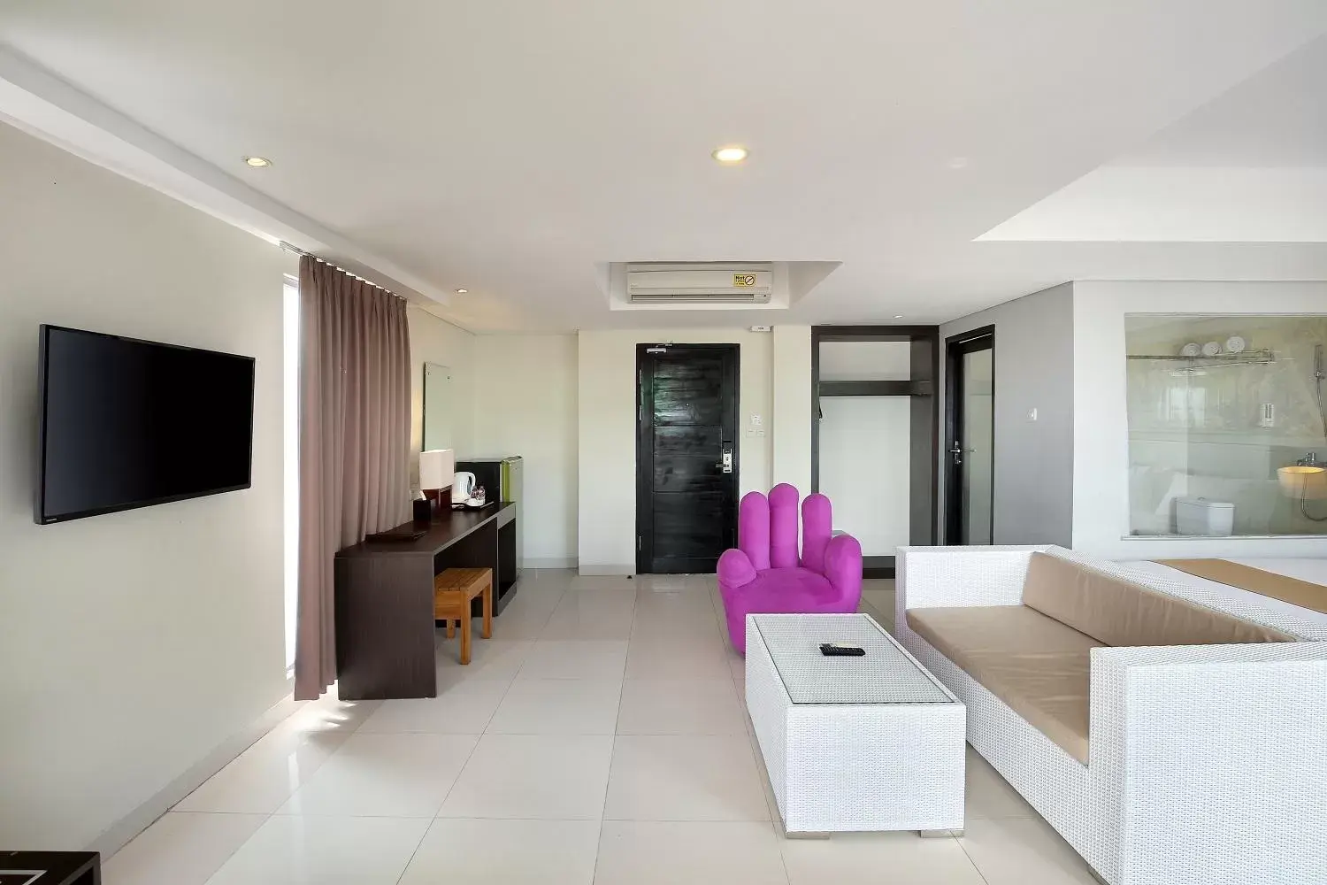 Seating area, Bed in Rofa Kuta Hotel - CHSE Certified Seating area, Bed in Rofa Kuta Hotel - CHSE Certified