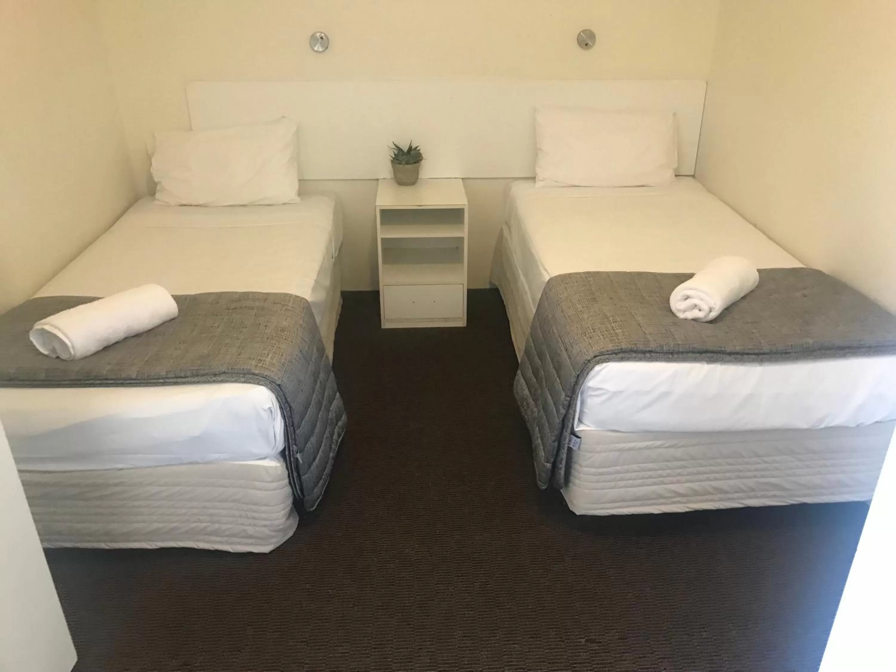 Bed in Blue Pelican Motel