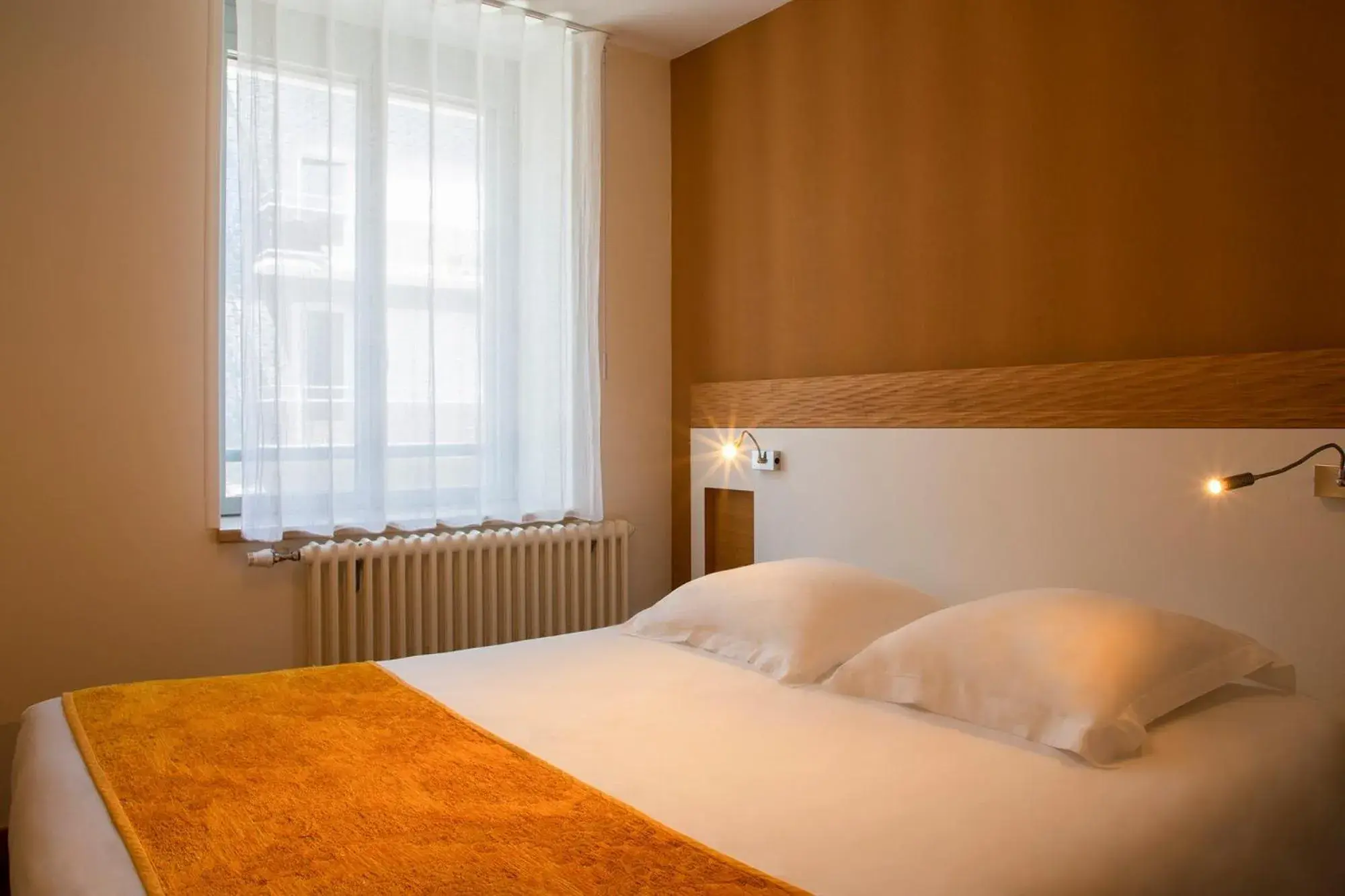 Decorative detail, Bed in Hôtel de Perros, The Originals Boutique Decorative detail, Bed in Hôtel de Perros, The Originals Boutique