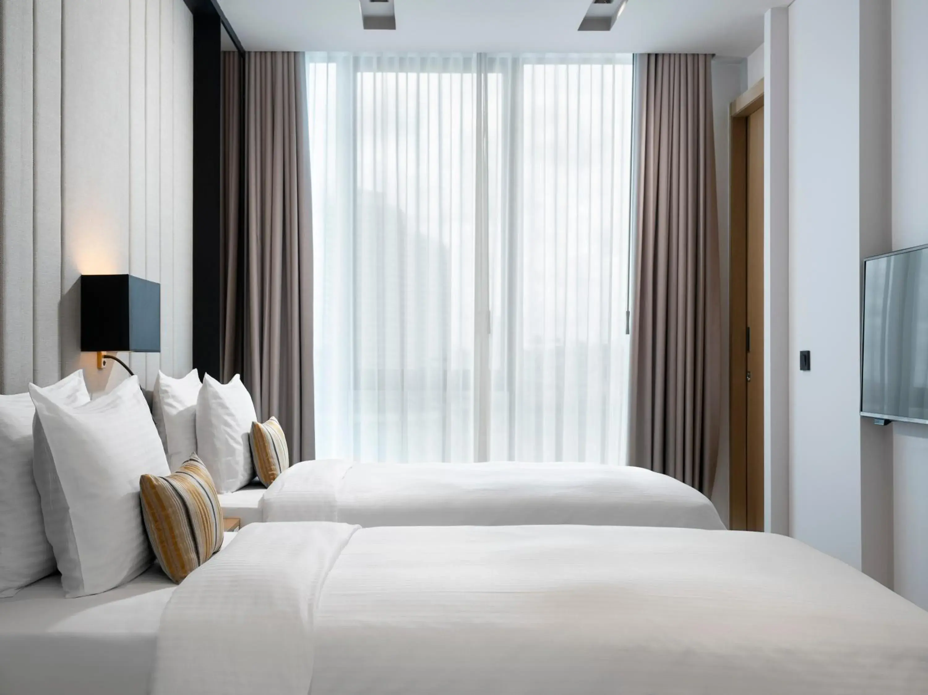Bed in Centro Westside by Rotana