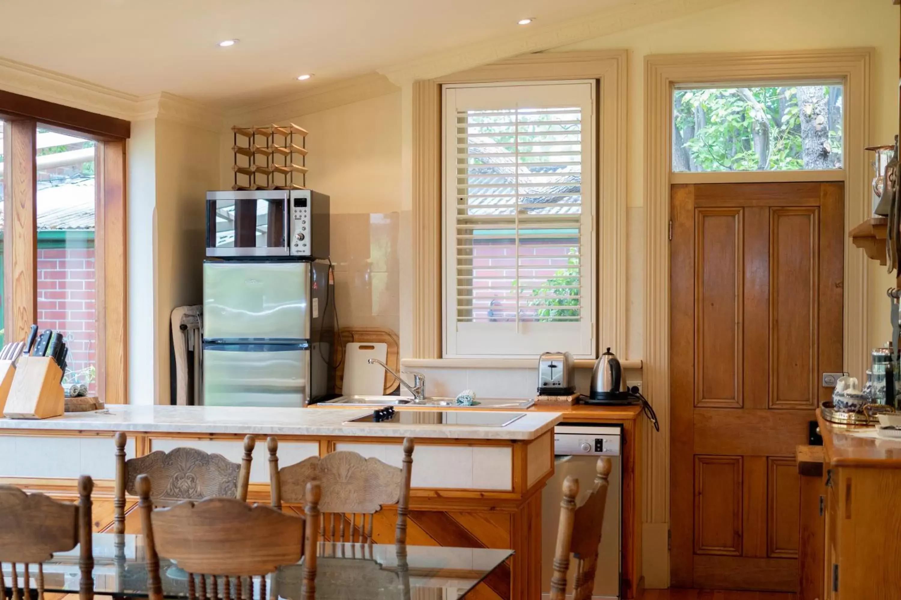 Kitchen or kitchenette, Dining Area in North Adelaide Heritage Cottages & Apartments