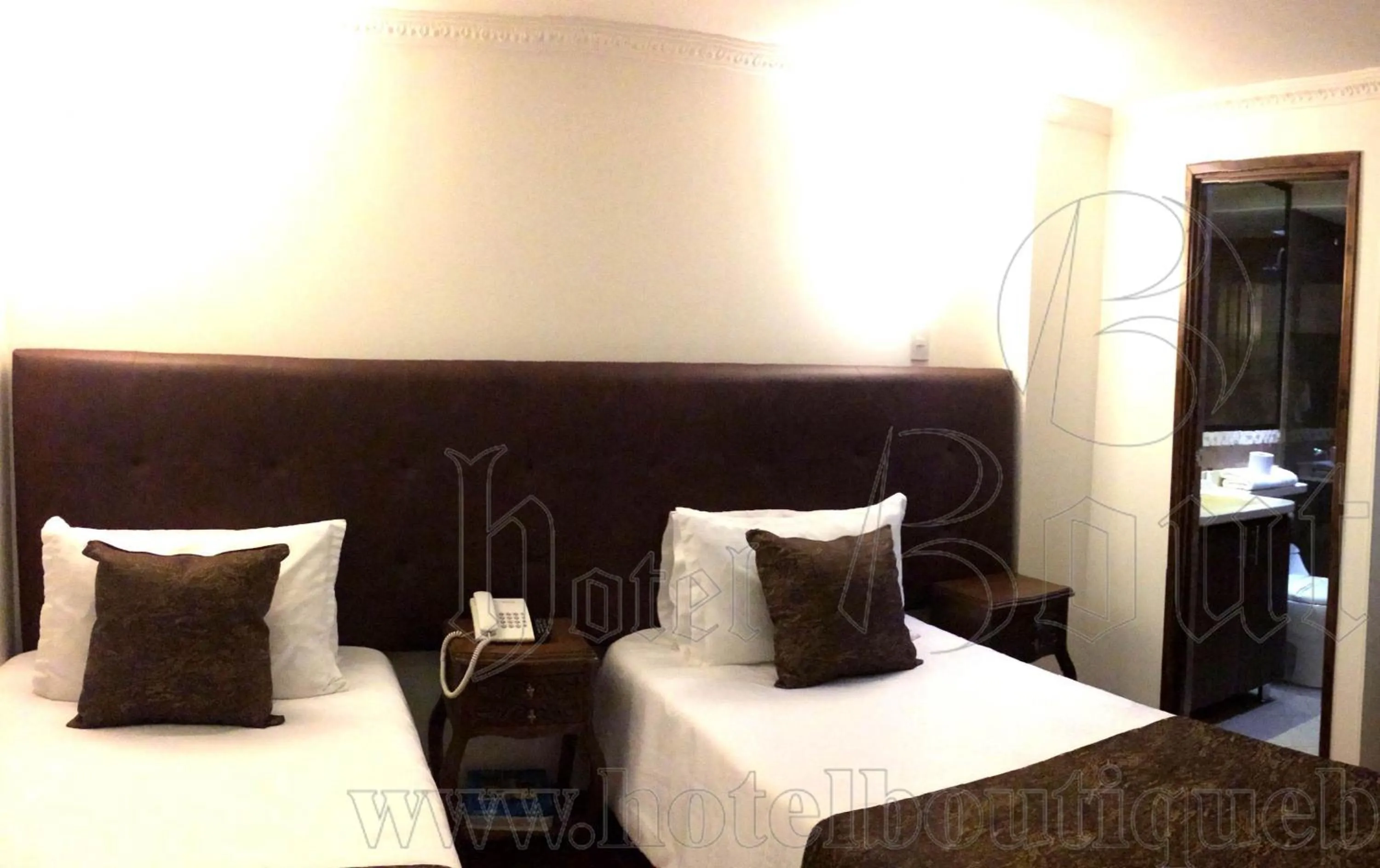 Bed in Hotel Boutique Feria Internacional