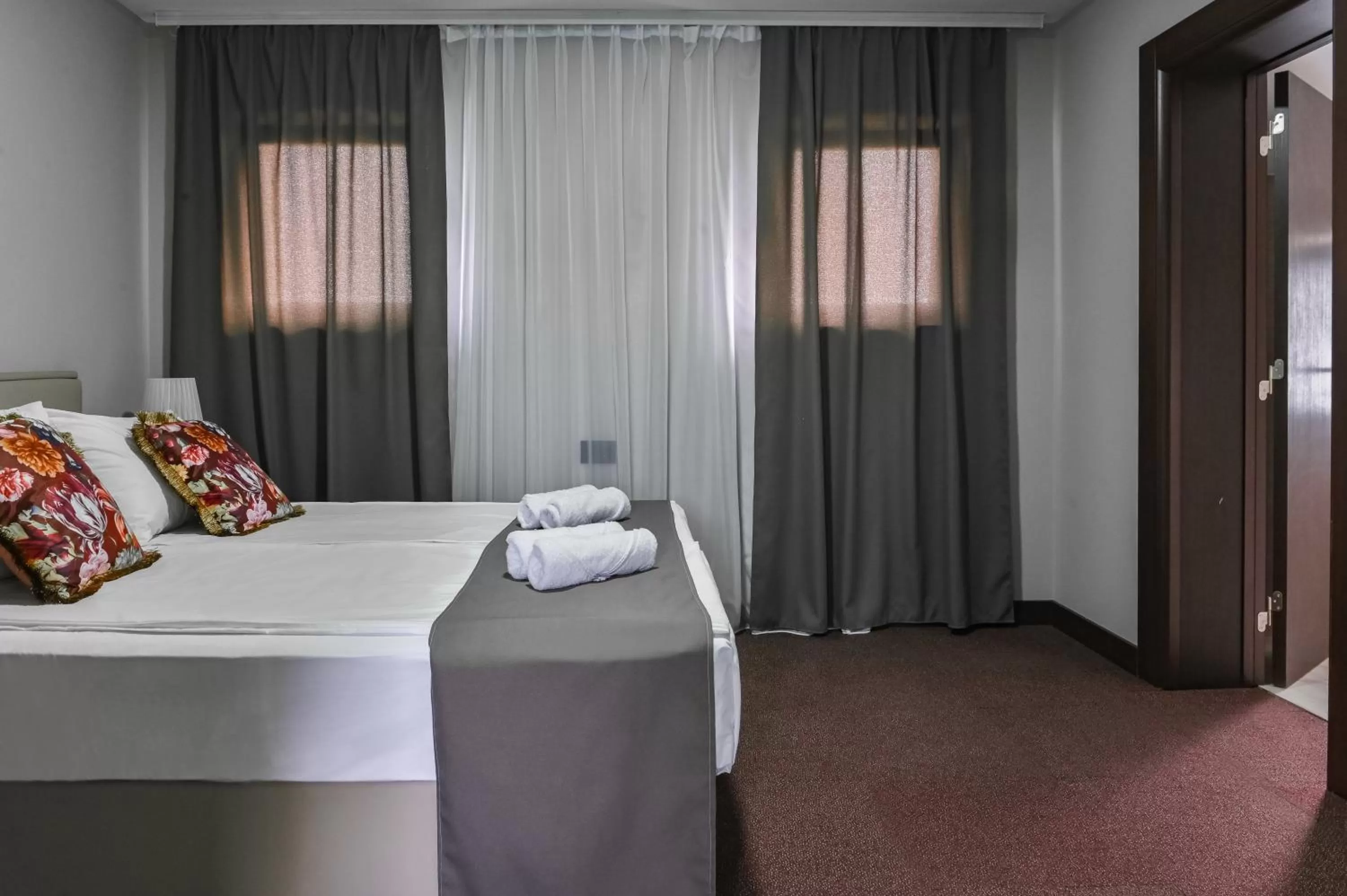 Bed in Garni Hotel Aline
