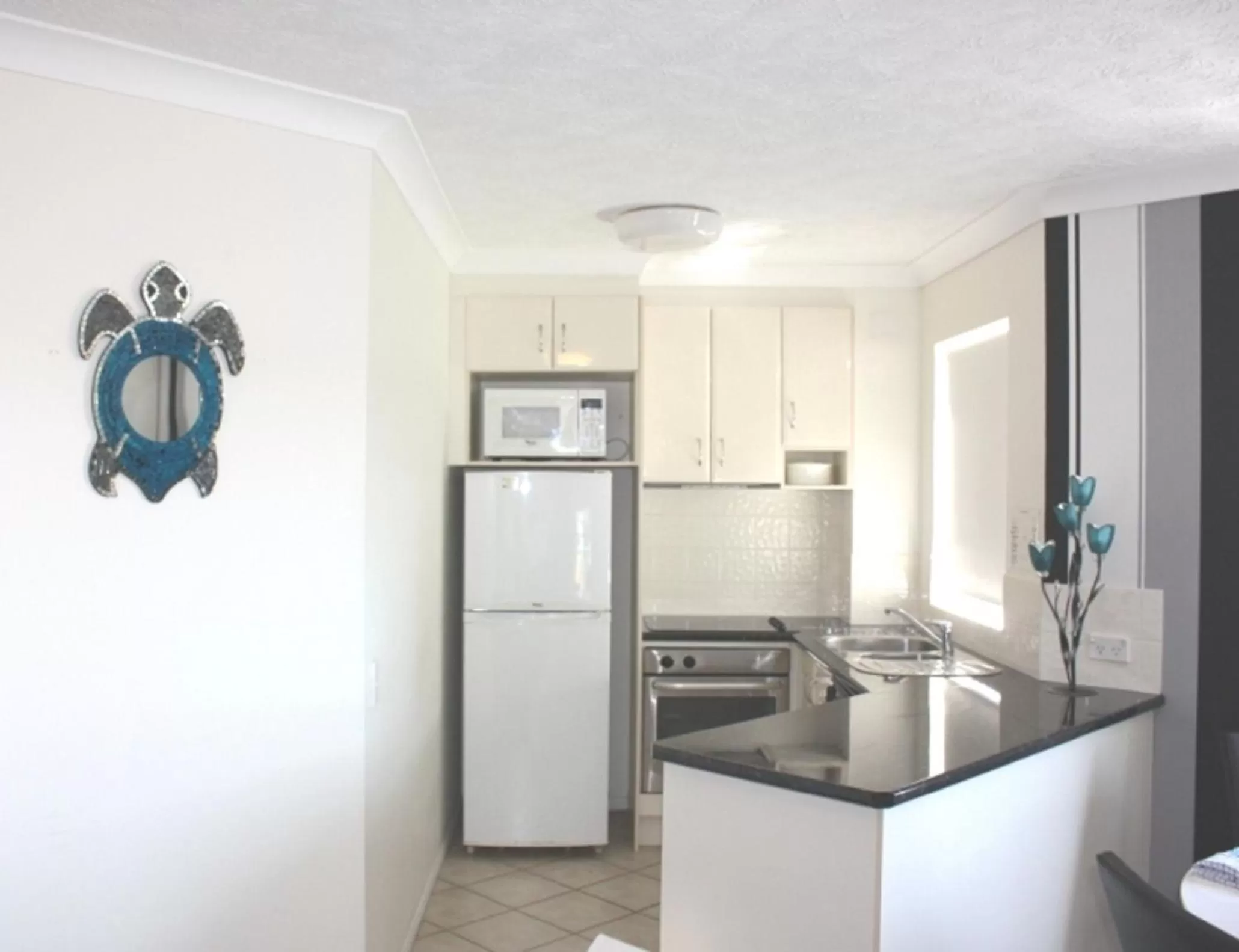 Kitchen or kitchenette in Royal Pacific Resort