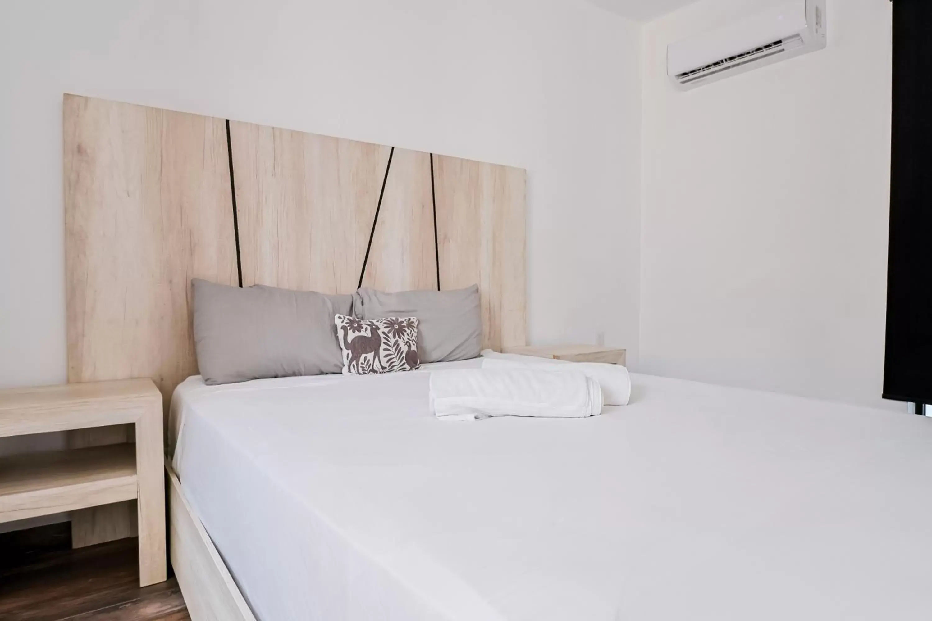 Bed in Arkana 9 Suites