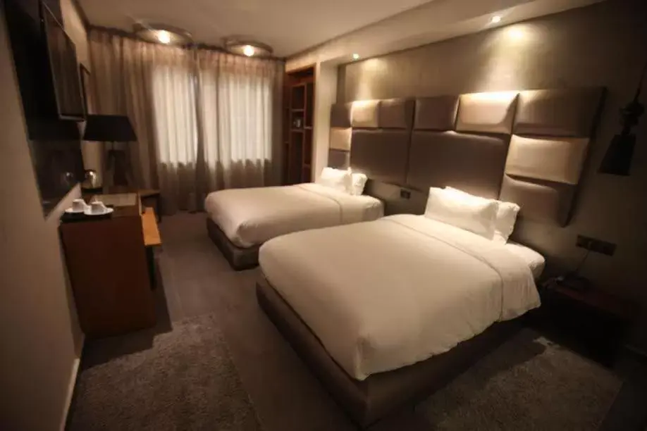 Bed in The Seven Hotel